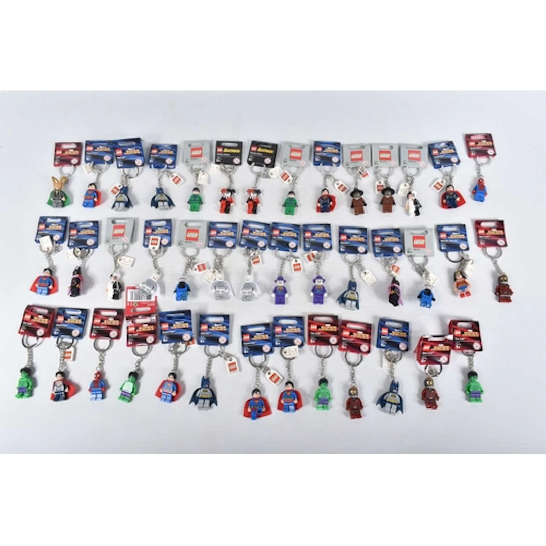 APPROXIMATELY FORTY-ONE LEGO DC AND MARVEL SUPERHERO KEYRING...