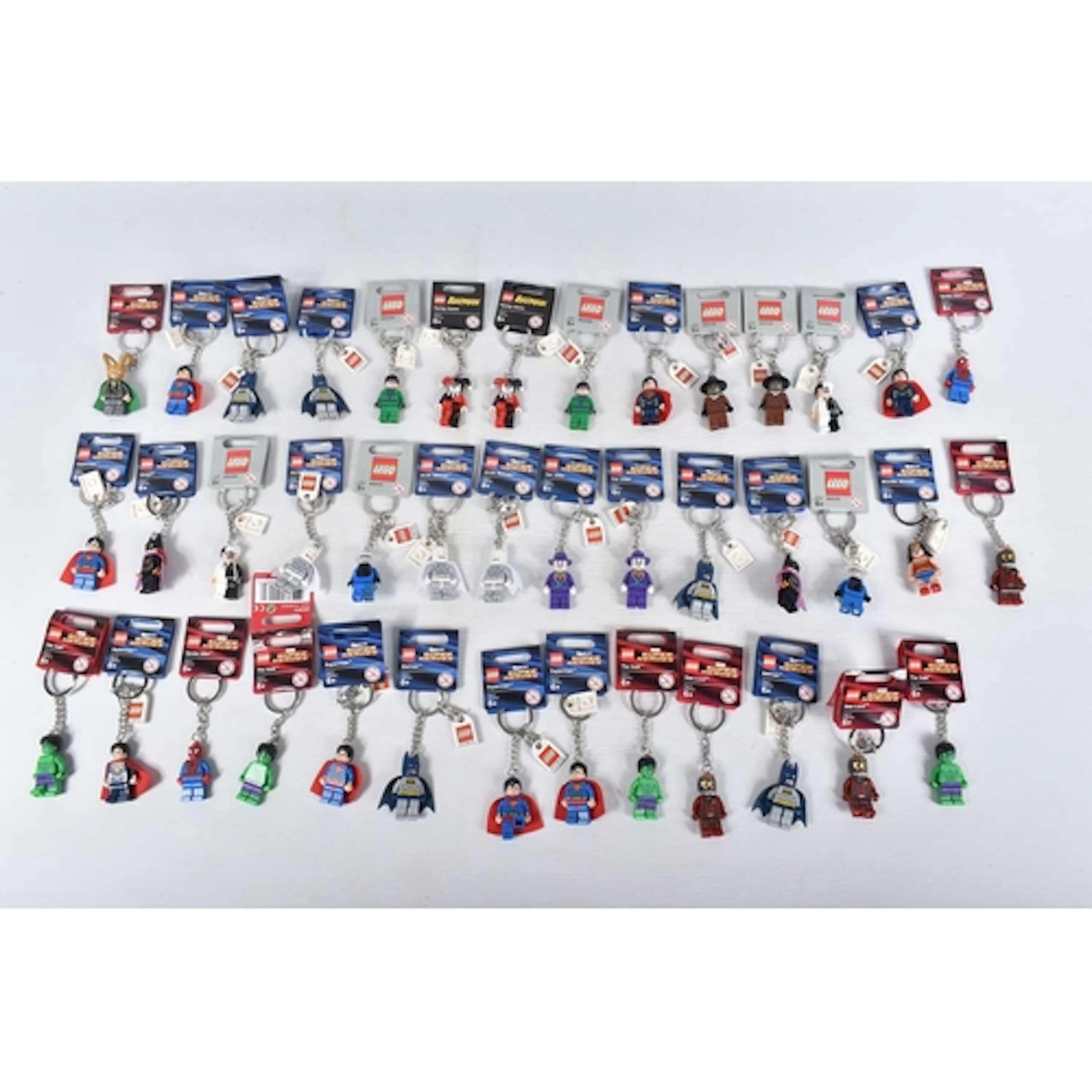 APPROXIMATELY FORTY-ONE LEGO DC AND MARVEL SUPERHERO KEYRING...