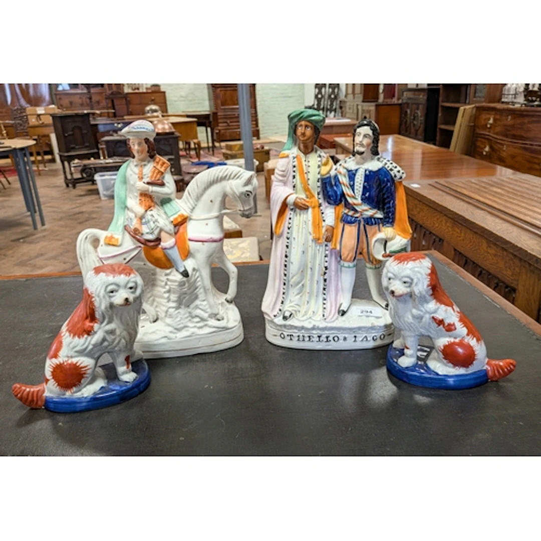 A Staffordshire flatback figure of Othello and Iago together...