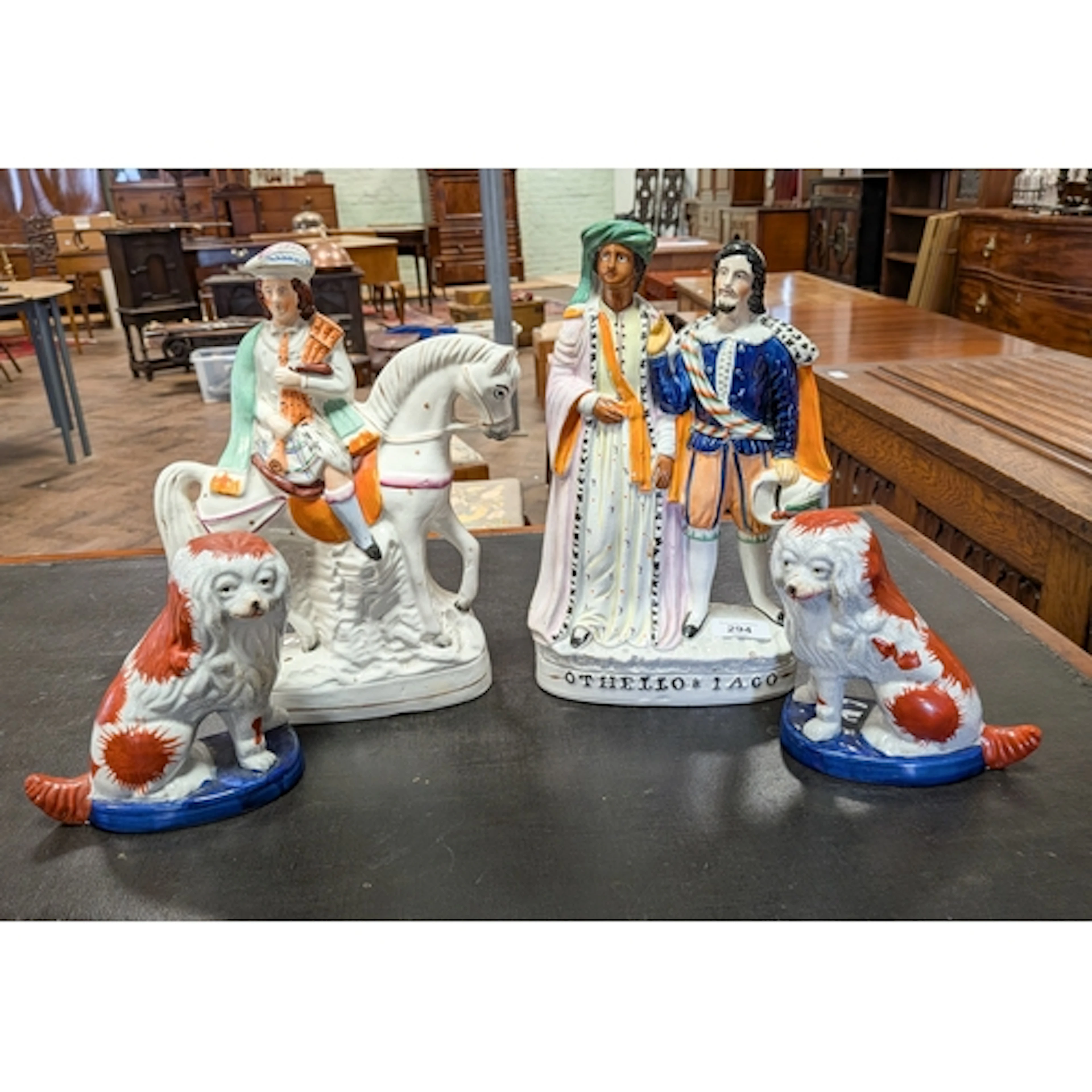 A Staffordshire flatback figure of Othello and Iago together...