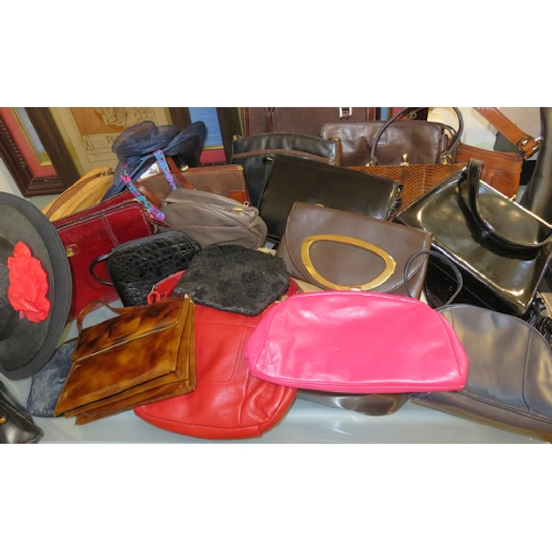 Quantity of ladies' handbags, etc.