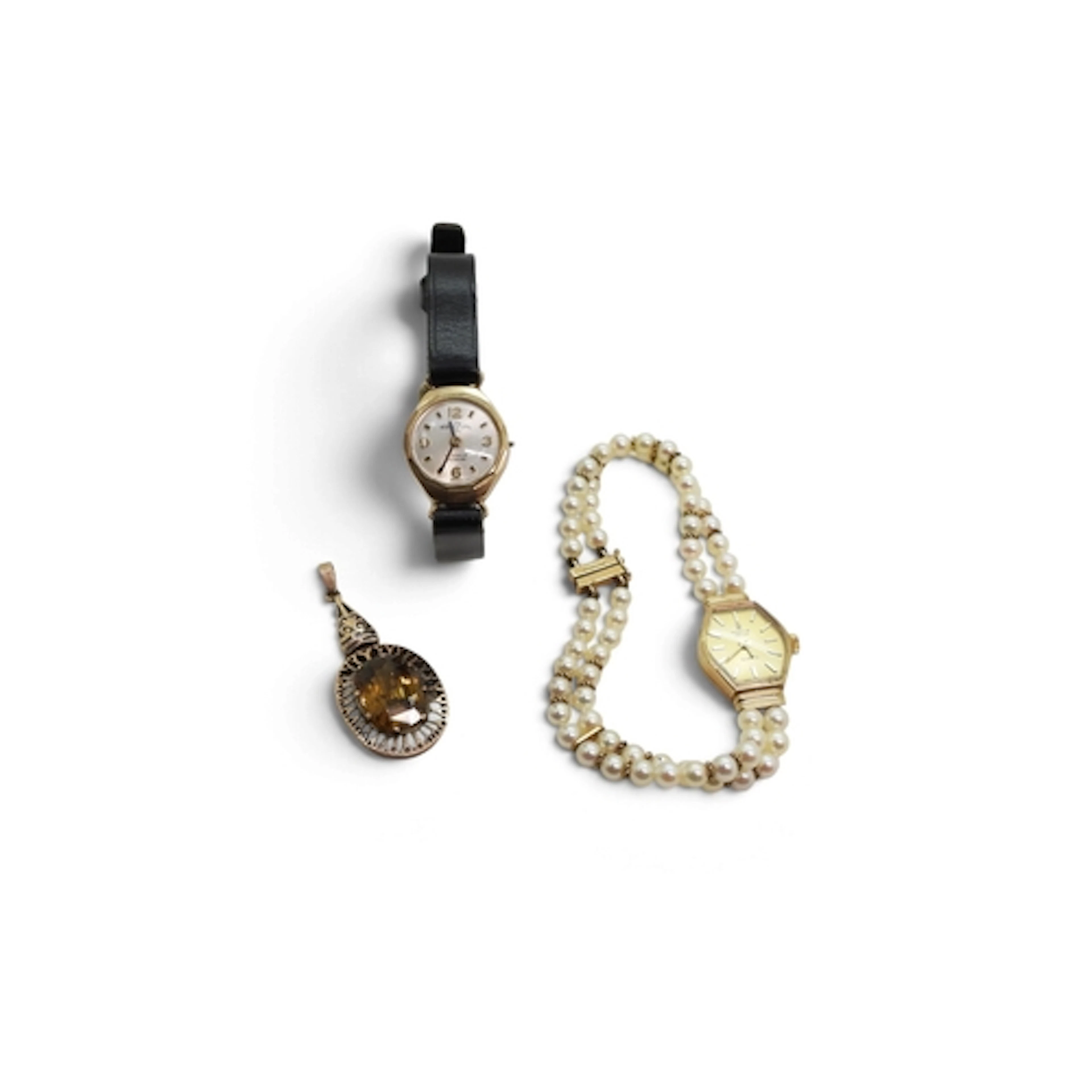 A 9ct gold Marvin Revue Quartz watch with a pearl strap, gol...