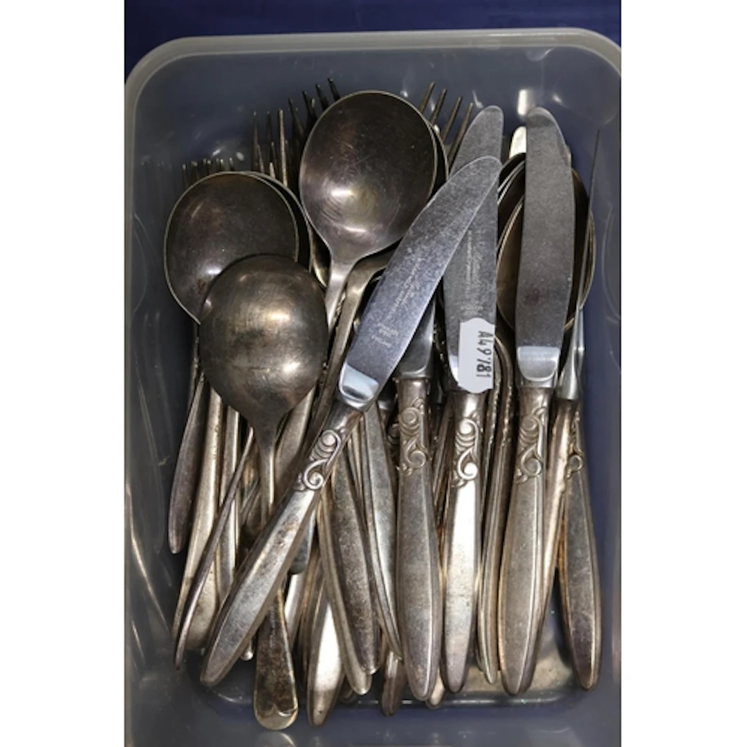 Flatware comprising spoons, knives, forks.