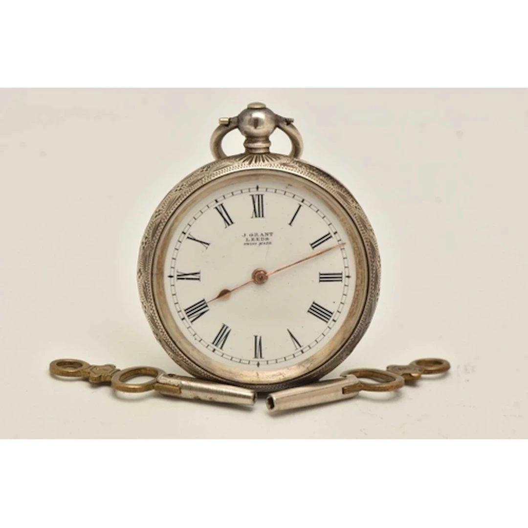 A WHITE METAL LADIES OPEN FACE POCKET WATCH, key wound movem...