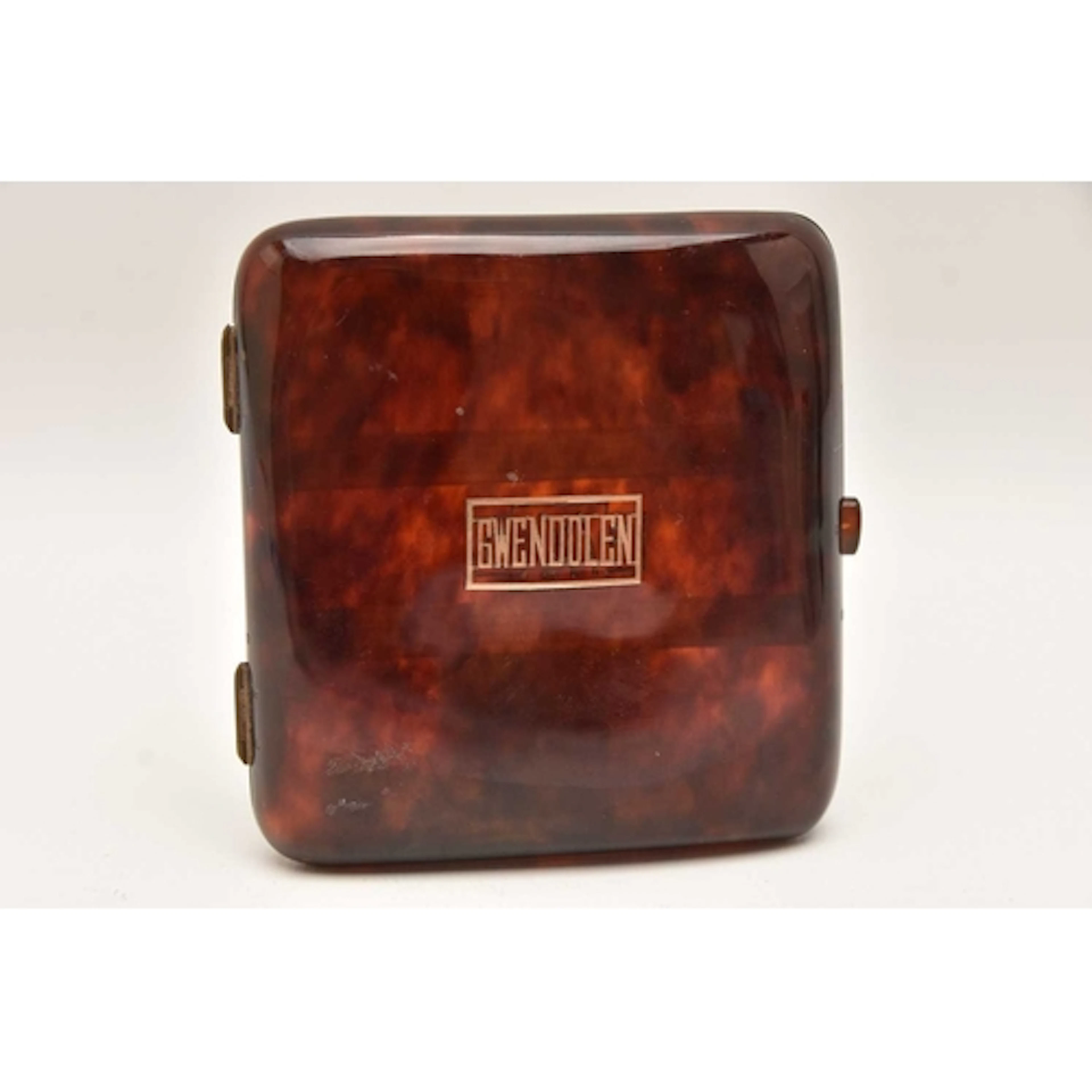 A TORTOISESHELL AND ROSE METAL INLAID CIGARETTE CASE, inscri...