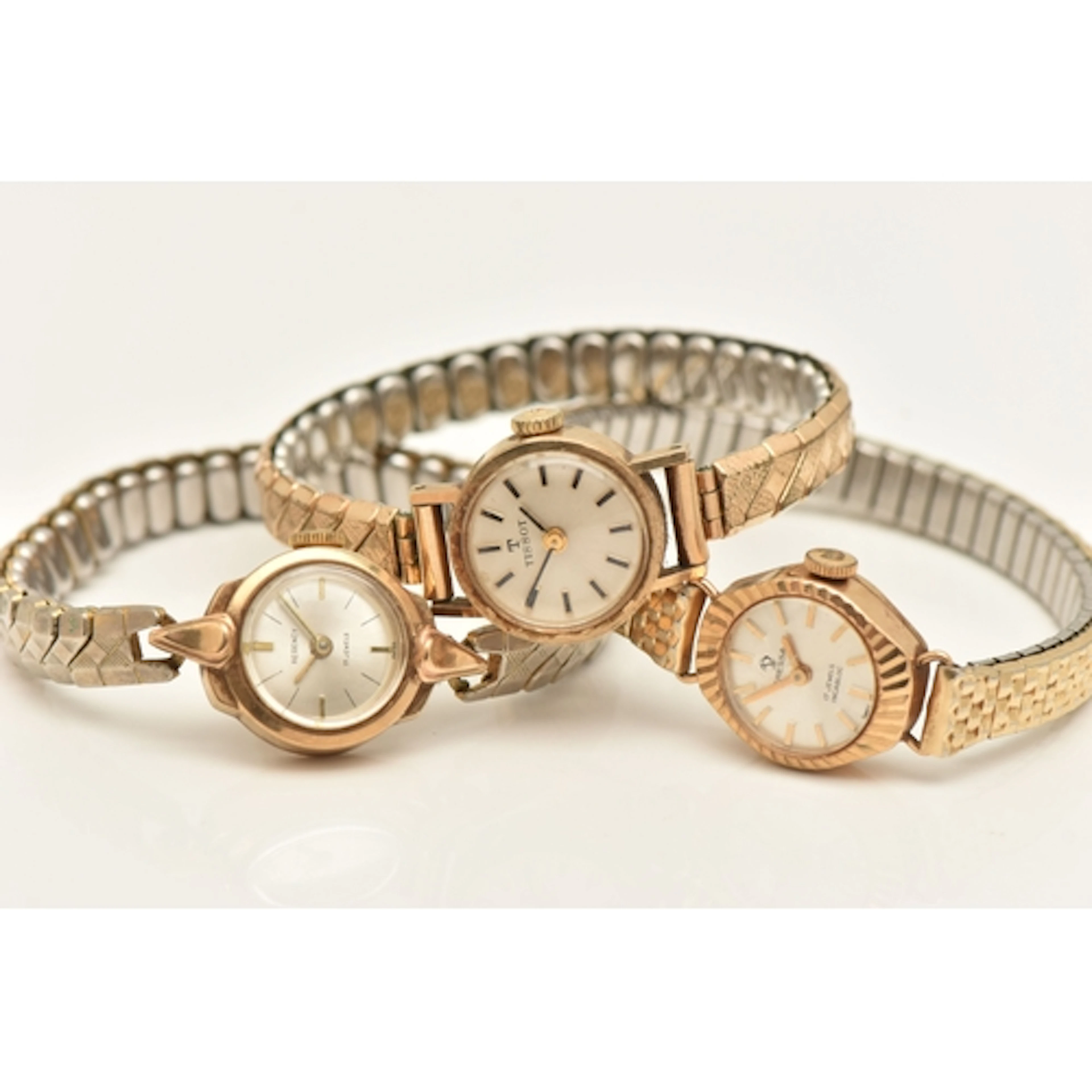 THREE LADIES 9CT GOLD CASED WRISTWATCHES, names to include '...
