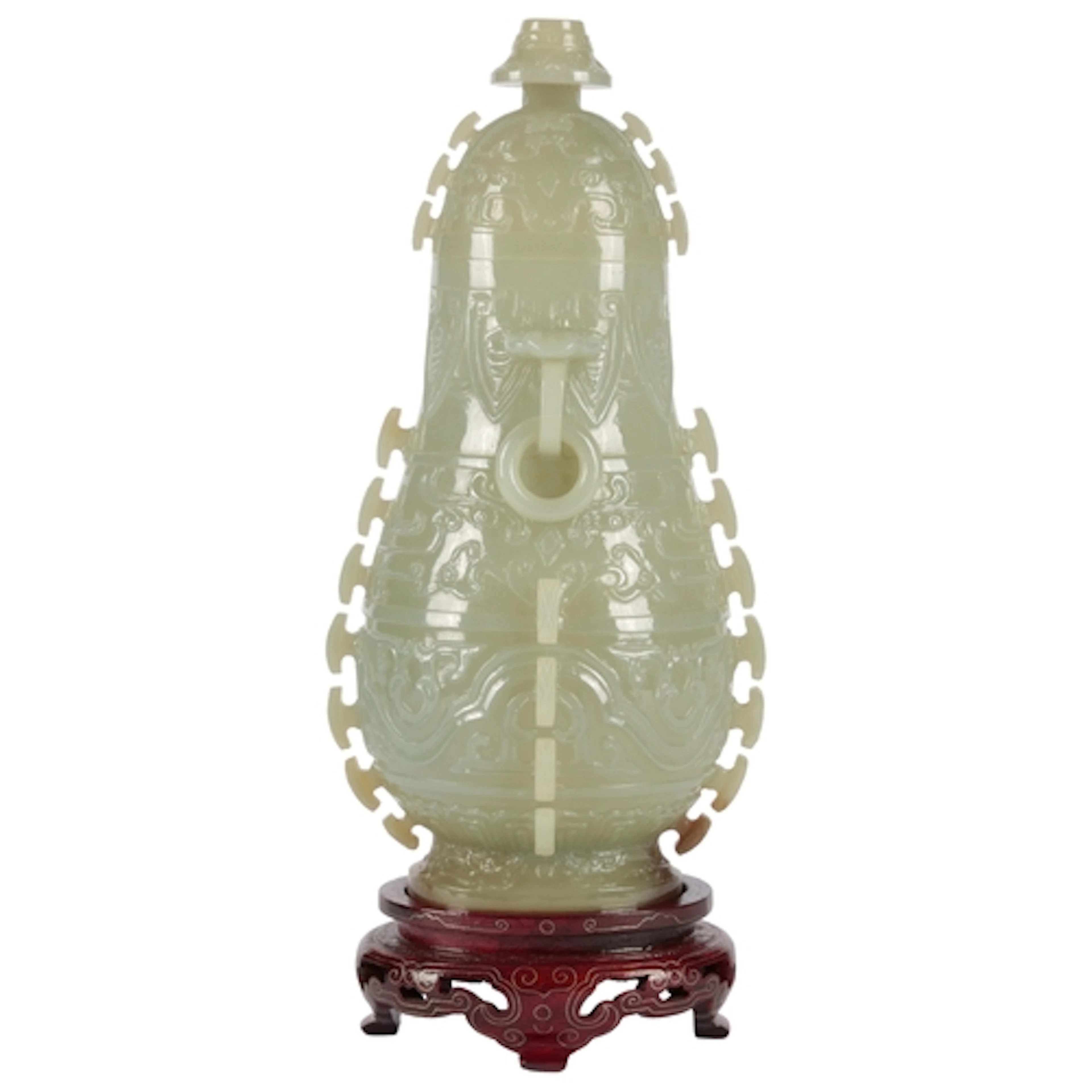 A large Chinese archaistic celadon jade pear-shaped vase and...
