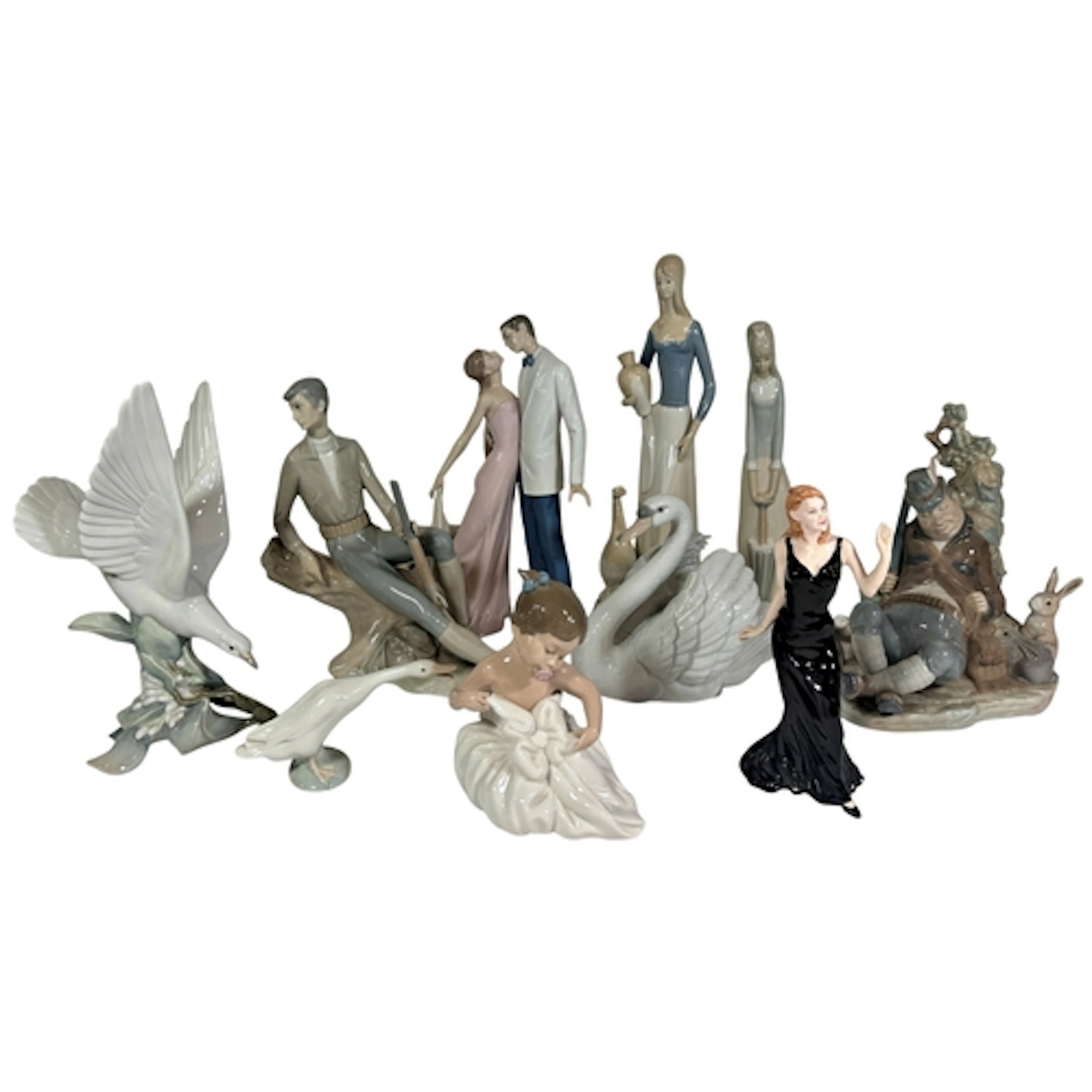 A collection of Lladro figures including 'Happy Anniversary ...