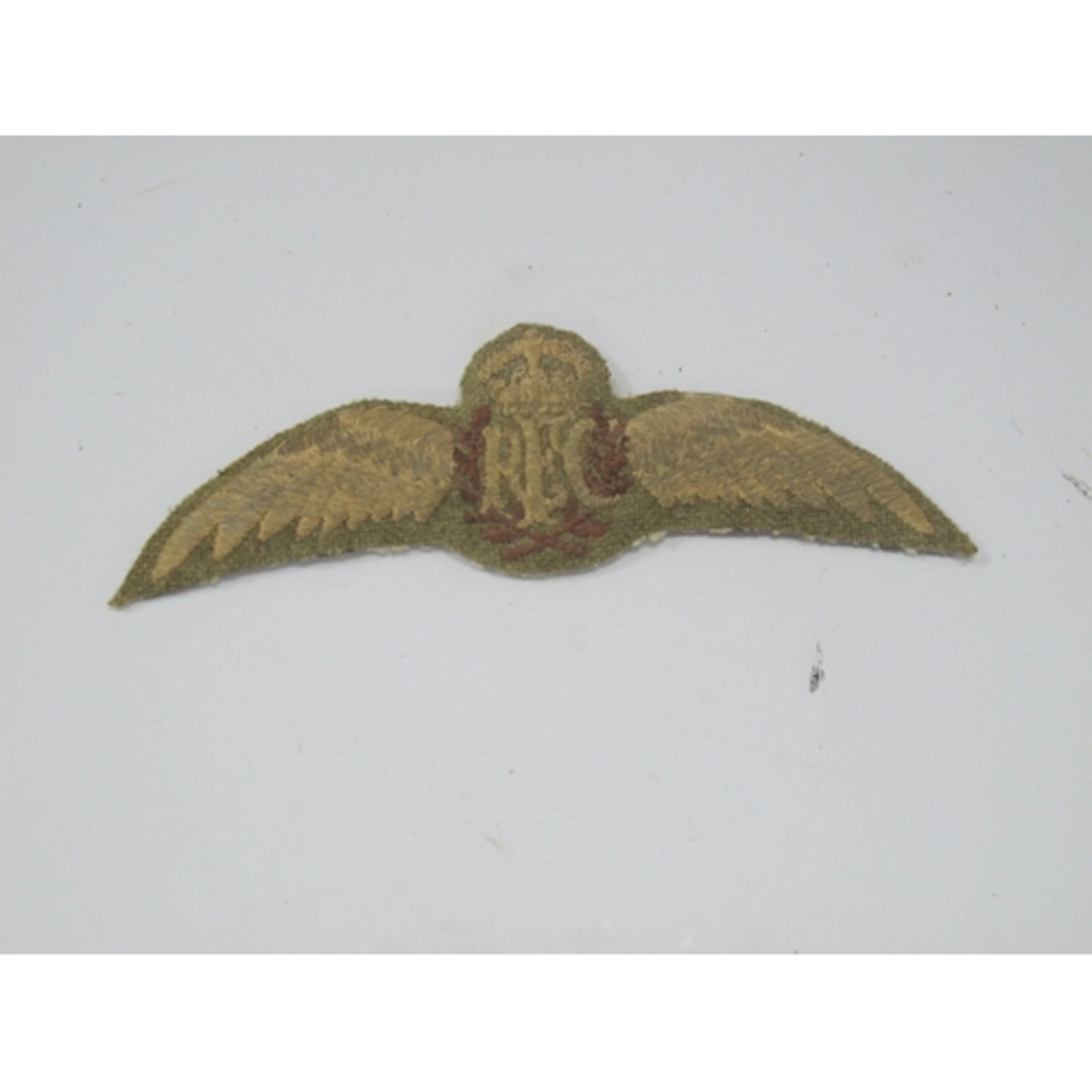 Royal Flying Corps Wings, RFC to centre within brown wreath,...