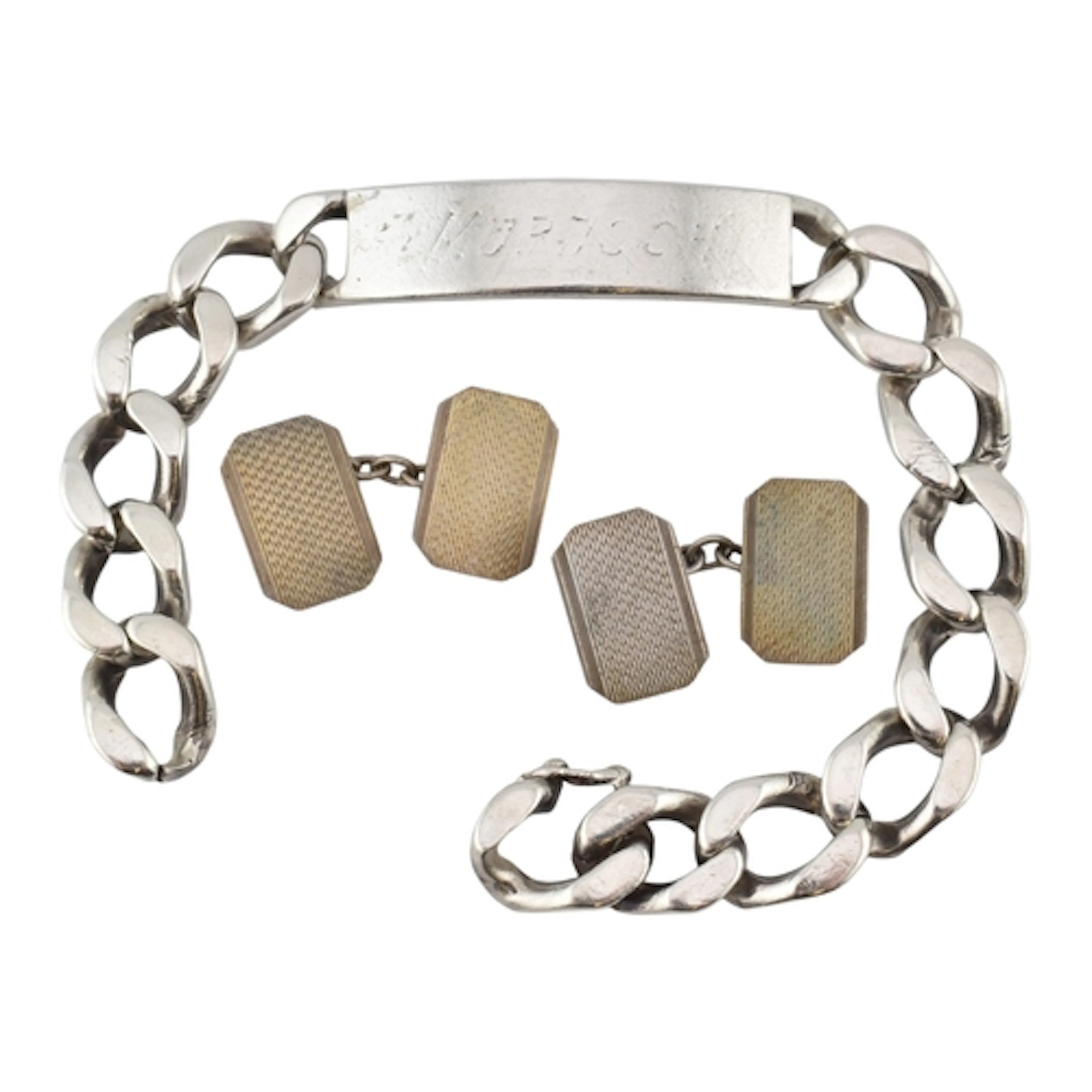 A 1980s hallmarked silver ID chain bracelet with a seamless ...
