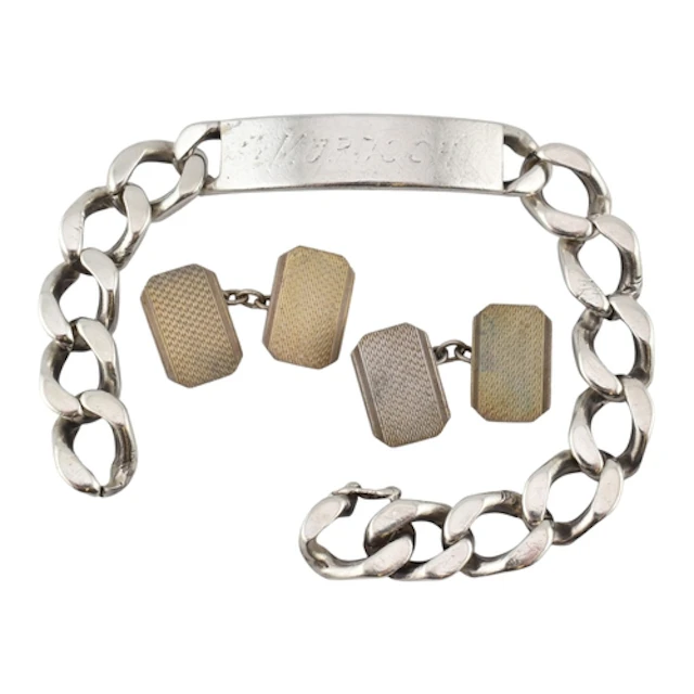 A 1980s hallmarked silver ID chain bracelet with a seamless ...