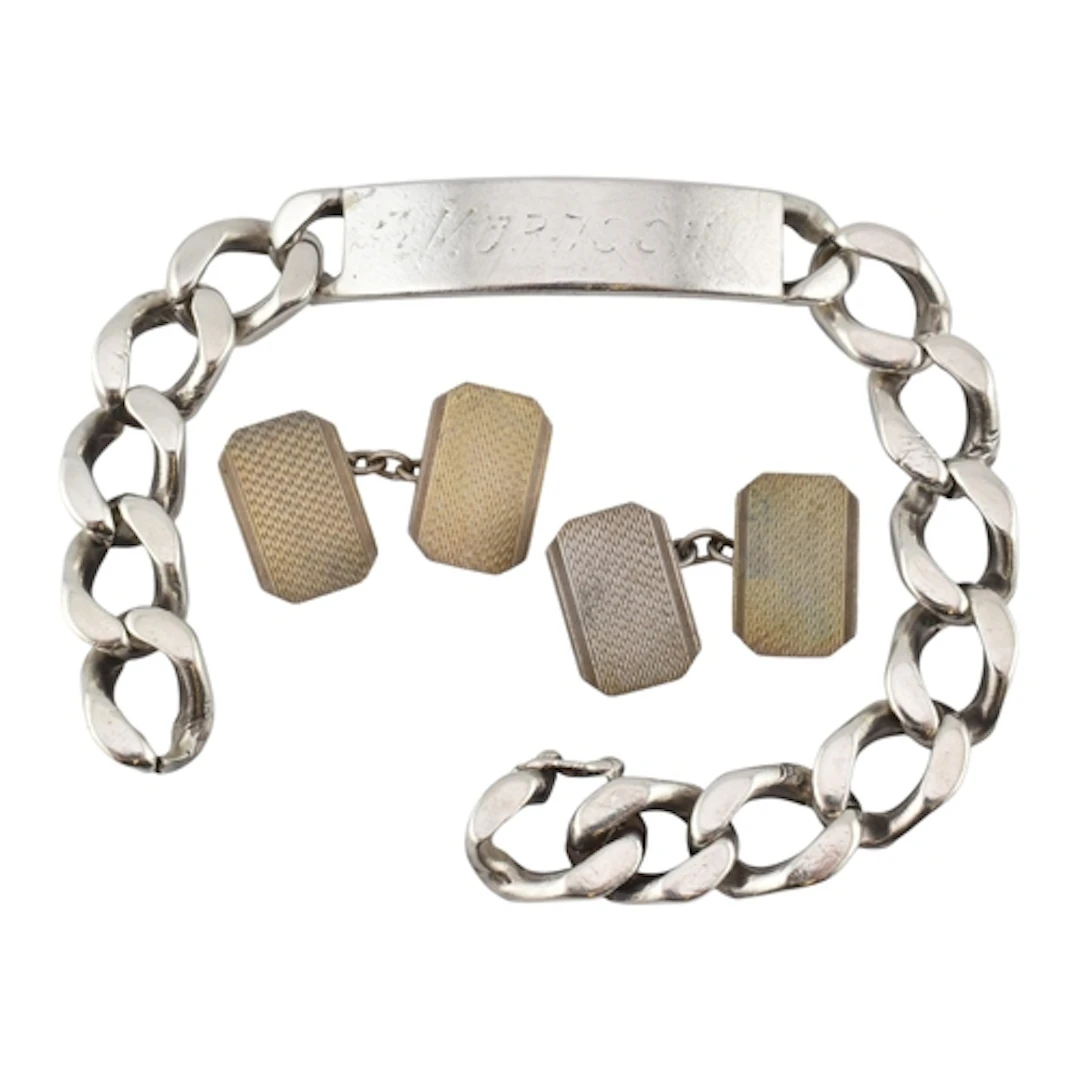 A 1980s hallmarked silver ID chain bracelet with a seamless ...