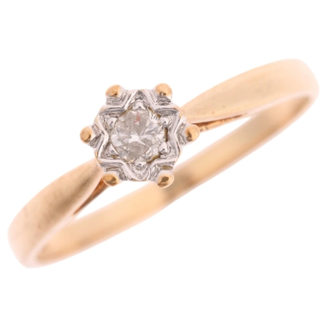A 9ct gold 0.10ct single stone diamond ring, illusion set wi...