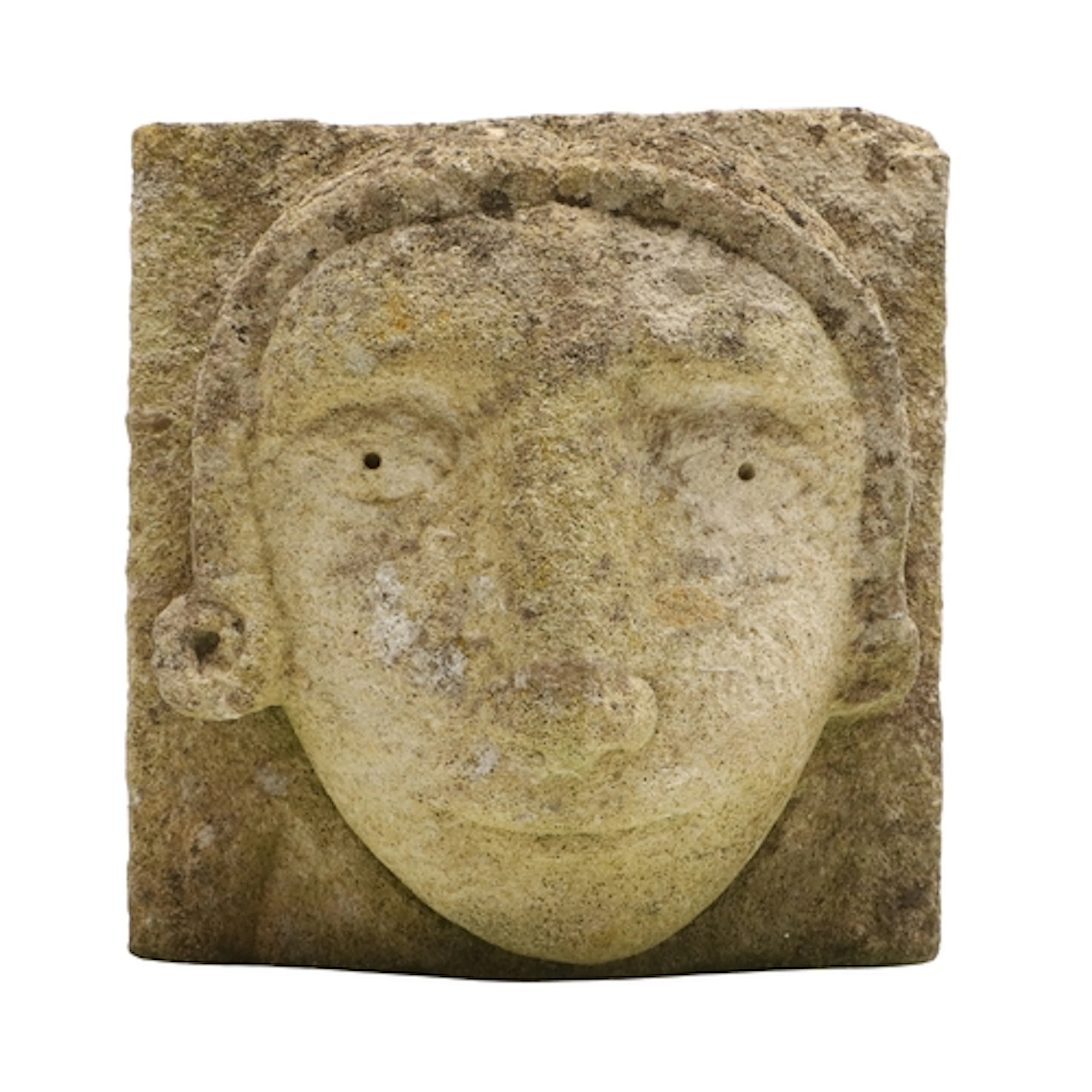 A MEDIEVAL STYLE CARVED STONE CORBEL. depicting the head of ...