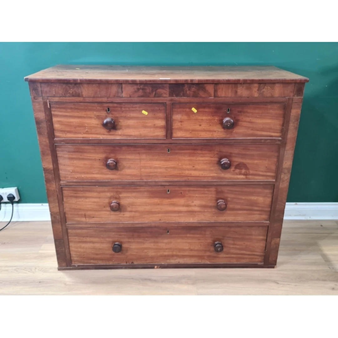 A mahogany Chest of drawers fitted two short over three long...