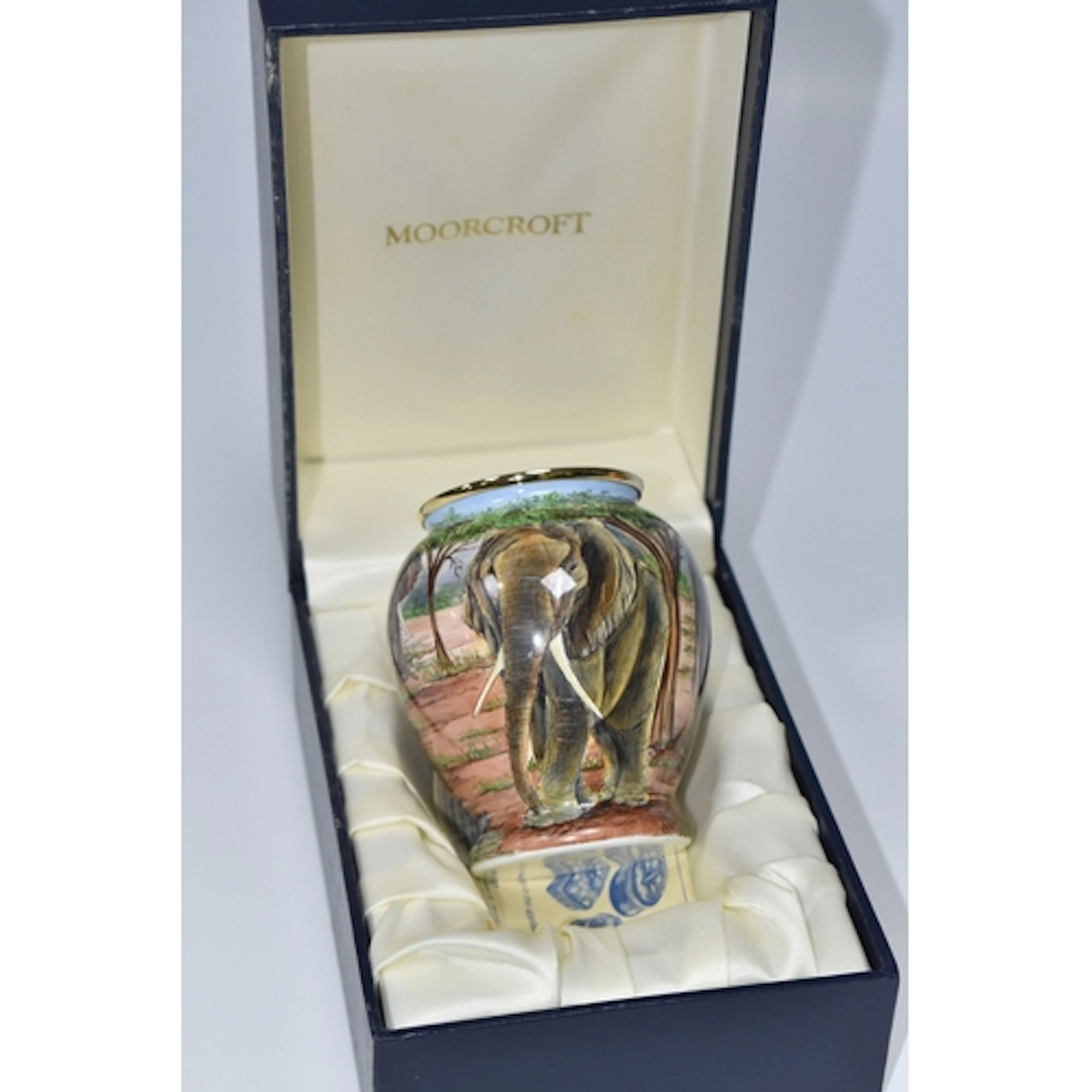 A BOXED MOORCROFT ENAMELS 'ELEPHANTS AT THE WATERING HOLE' V...