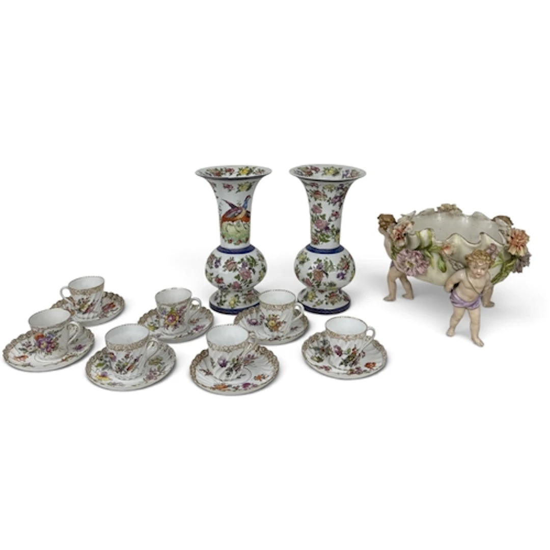 A SET OF DRESDEN PORCELAIN TEACUPS AND SAUCERS TOGETHER WITH...