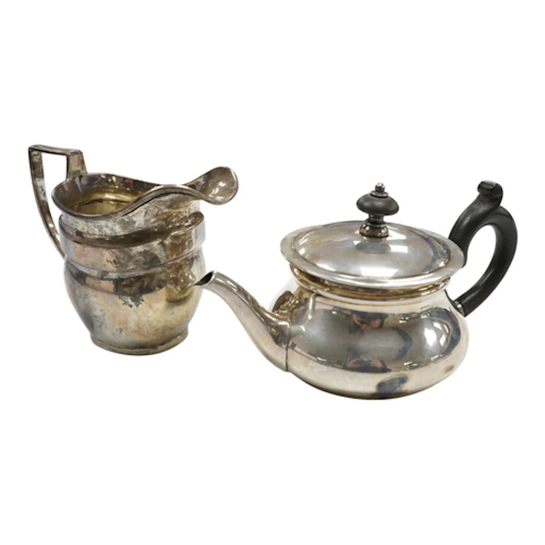 A George V silver bachelor's teapot, London, 1916, together ...