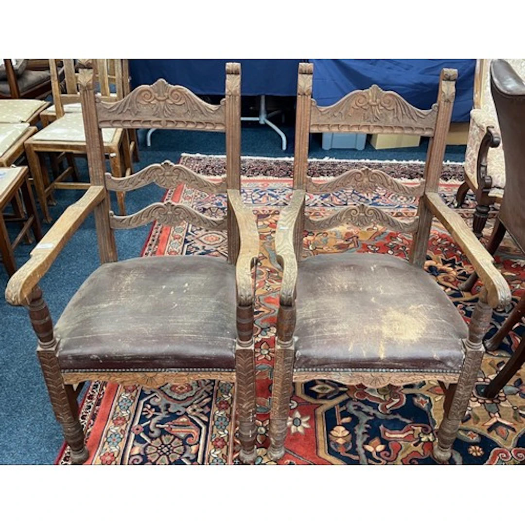 Pair of oak carved armchairs.