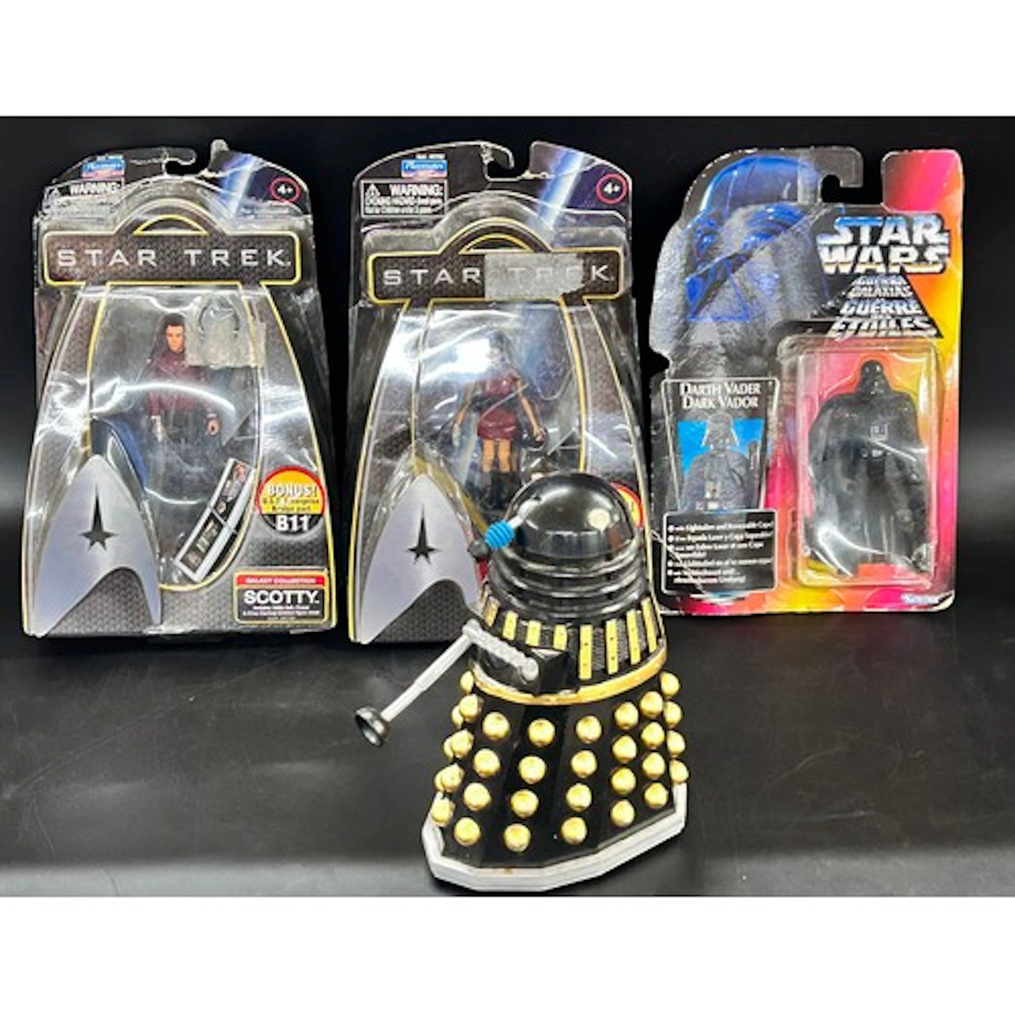 Two Star Trek figures, Star Wars Darth Vader and a Dalek