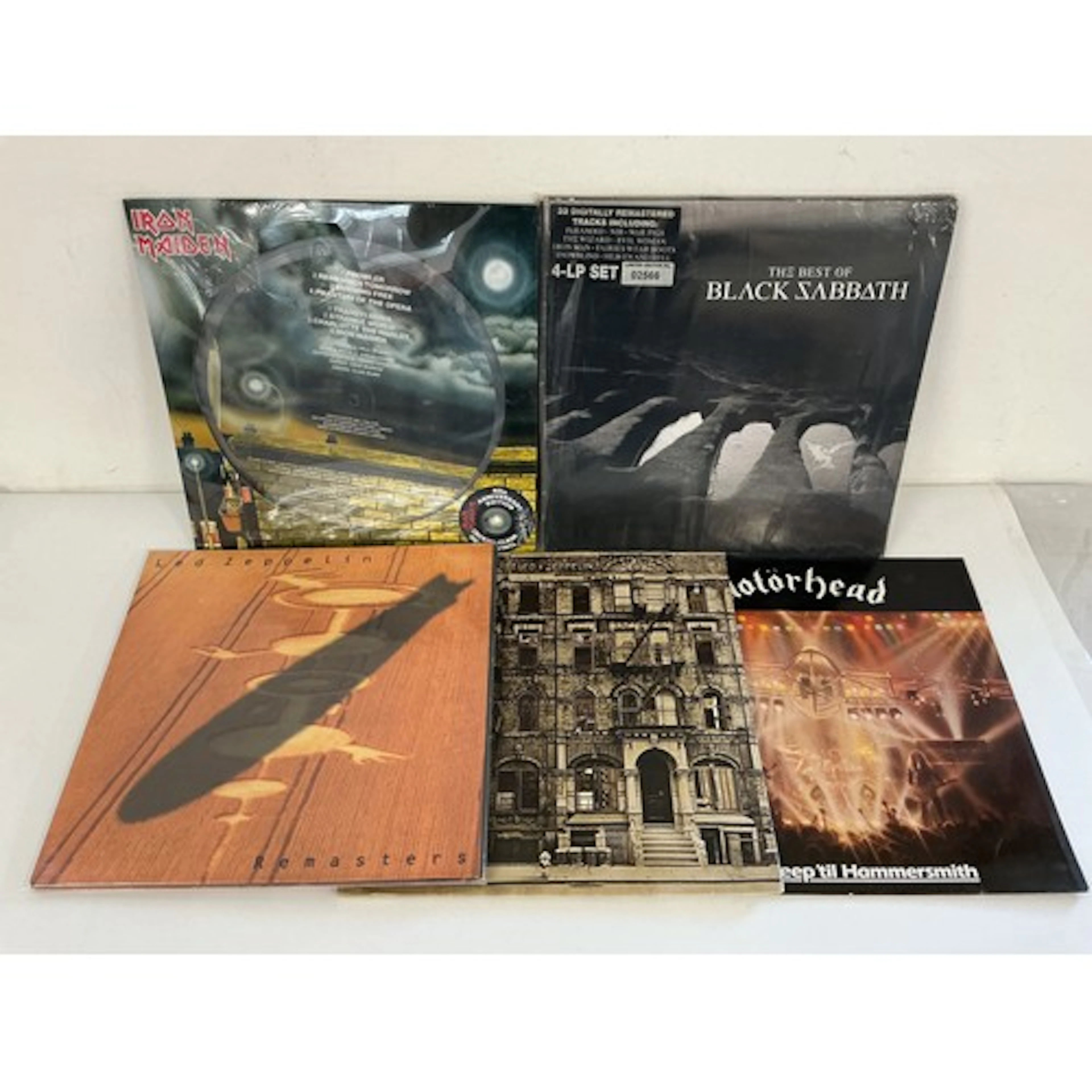 Five heavy rock LPs comprising a 4LP Best Of Black Sabbath, ...