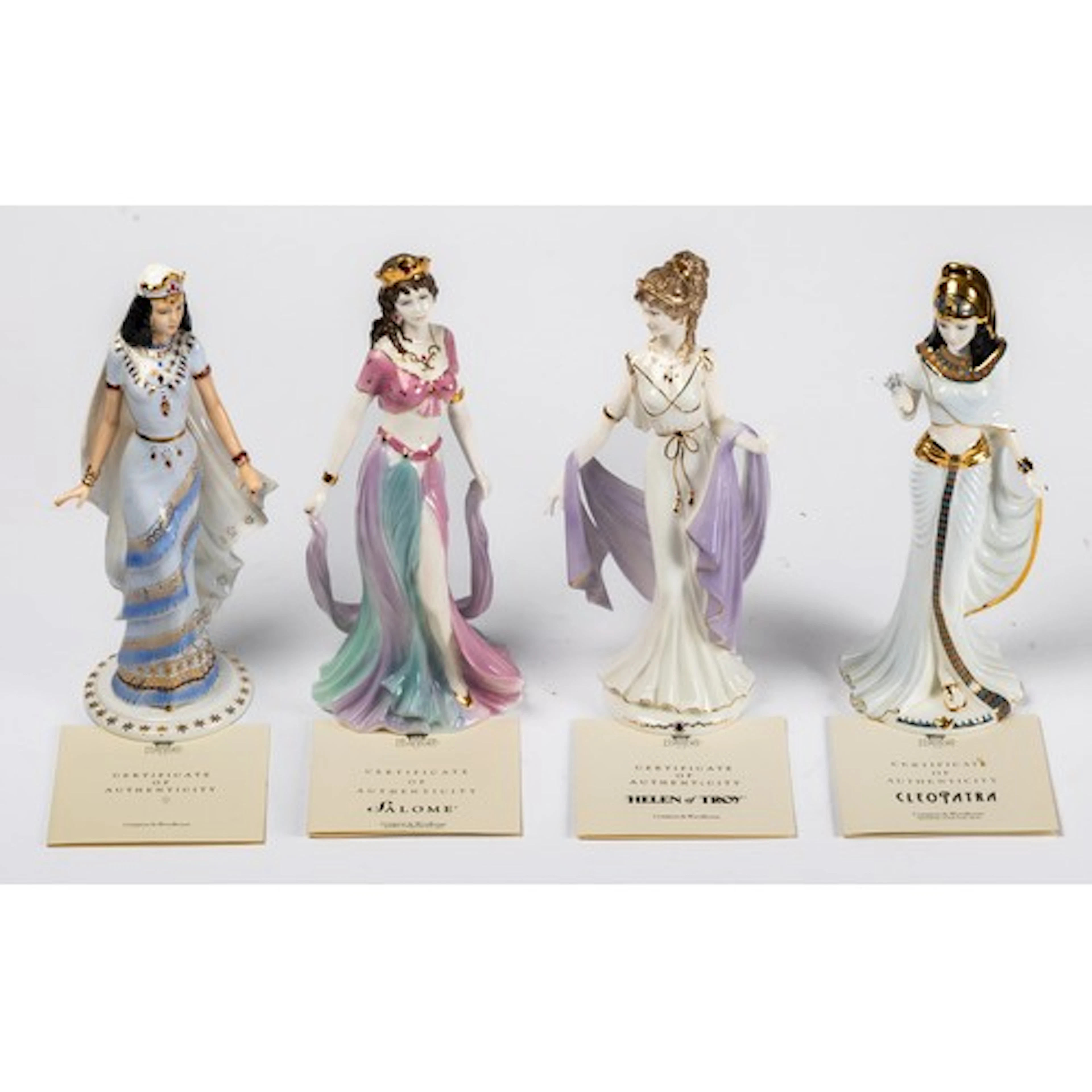 A set of four Coalport limited edition bone china figurines,...