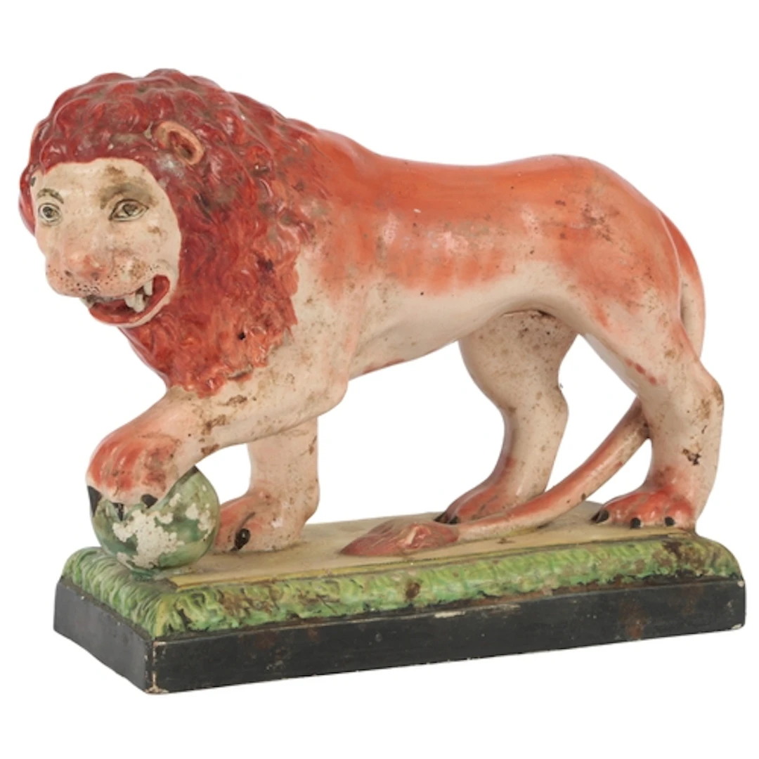 A Staffordshire pearlware figure of the Medici lion, early 1...
