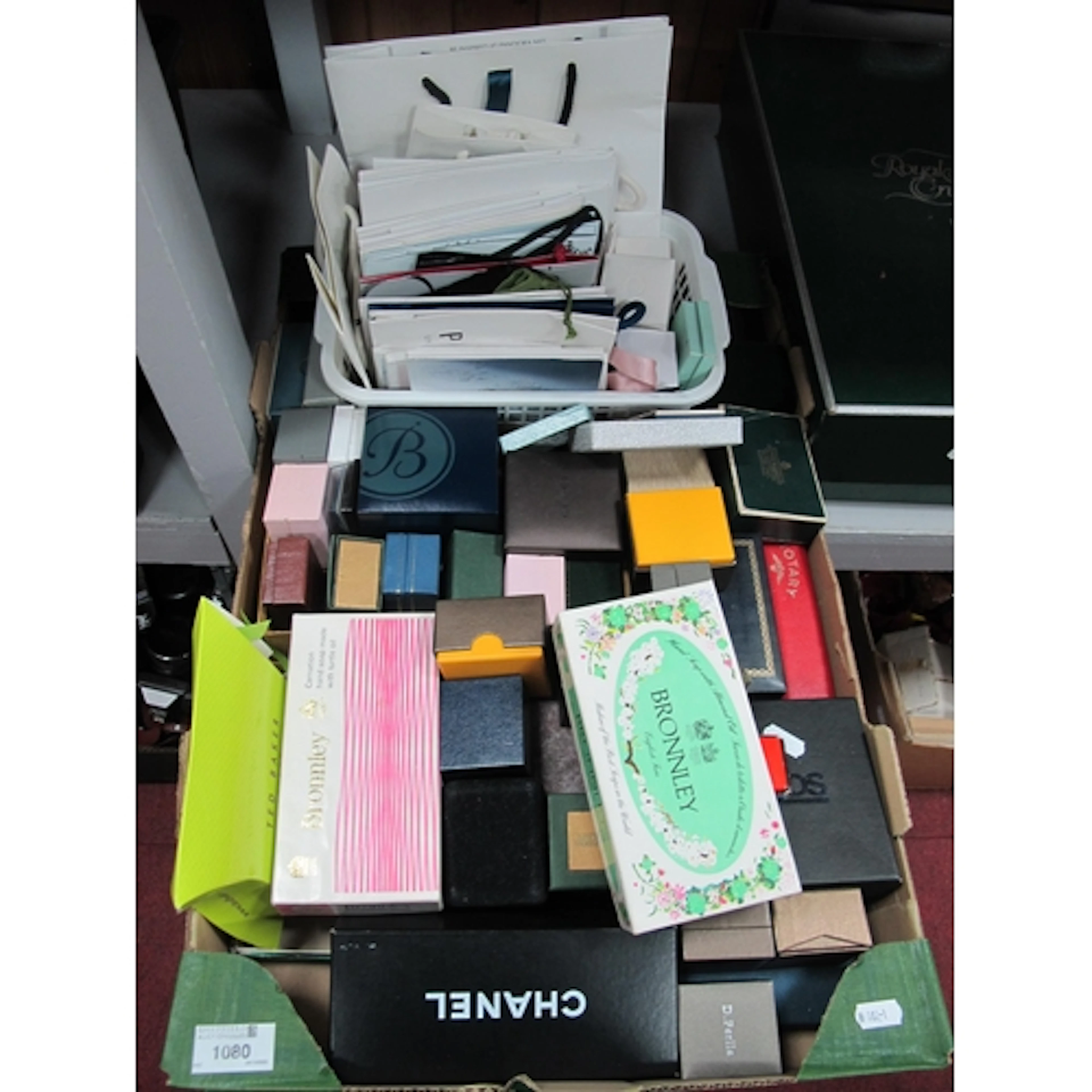 A Large Collection of Jewellery Boxes, bags and booklets, in...