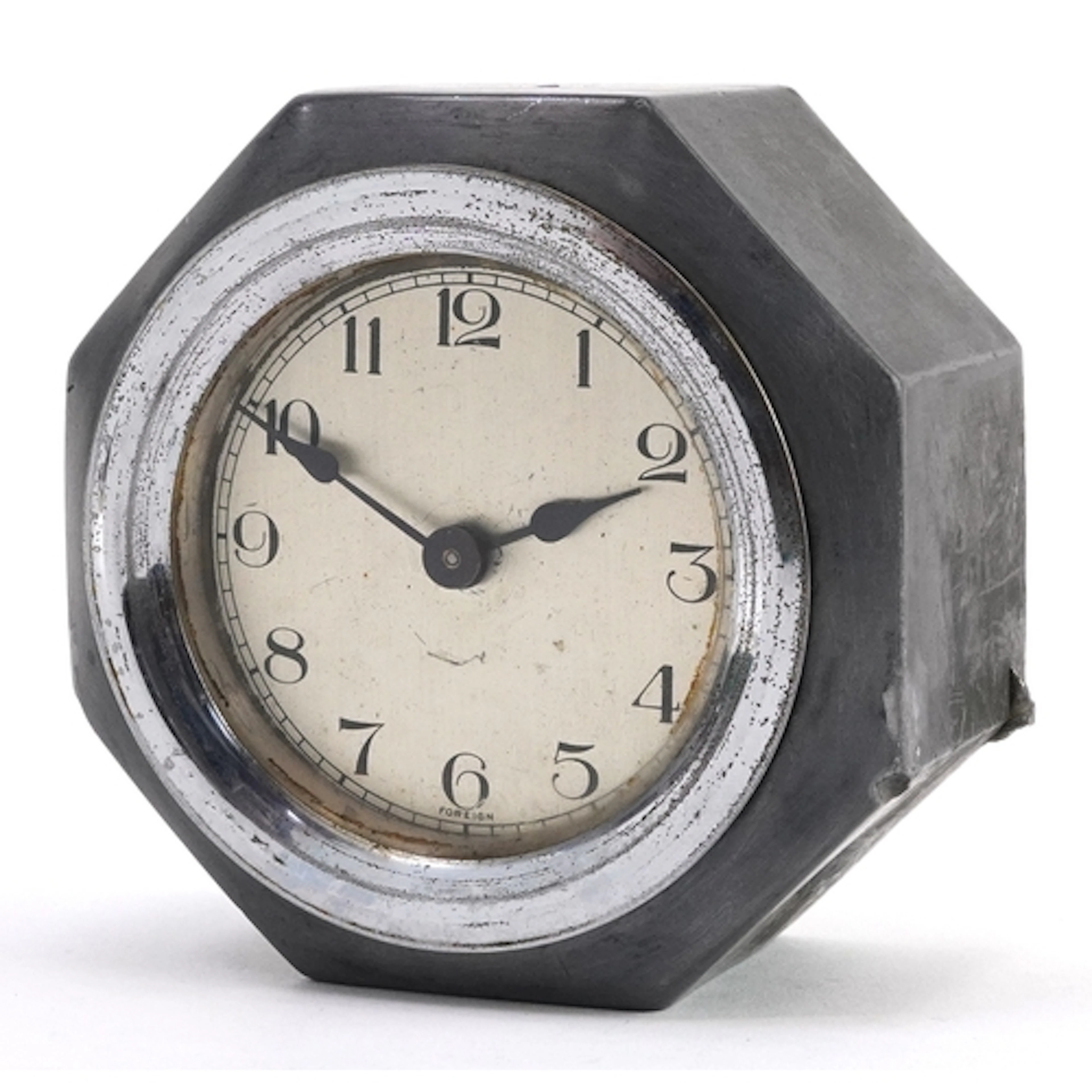 Antique octagonal pewter desk clock, 11cm high.
