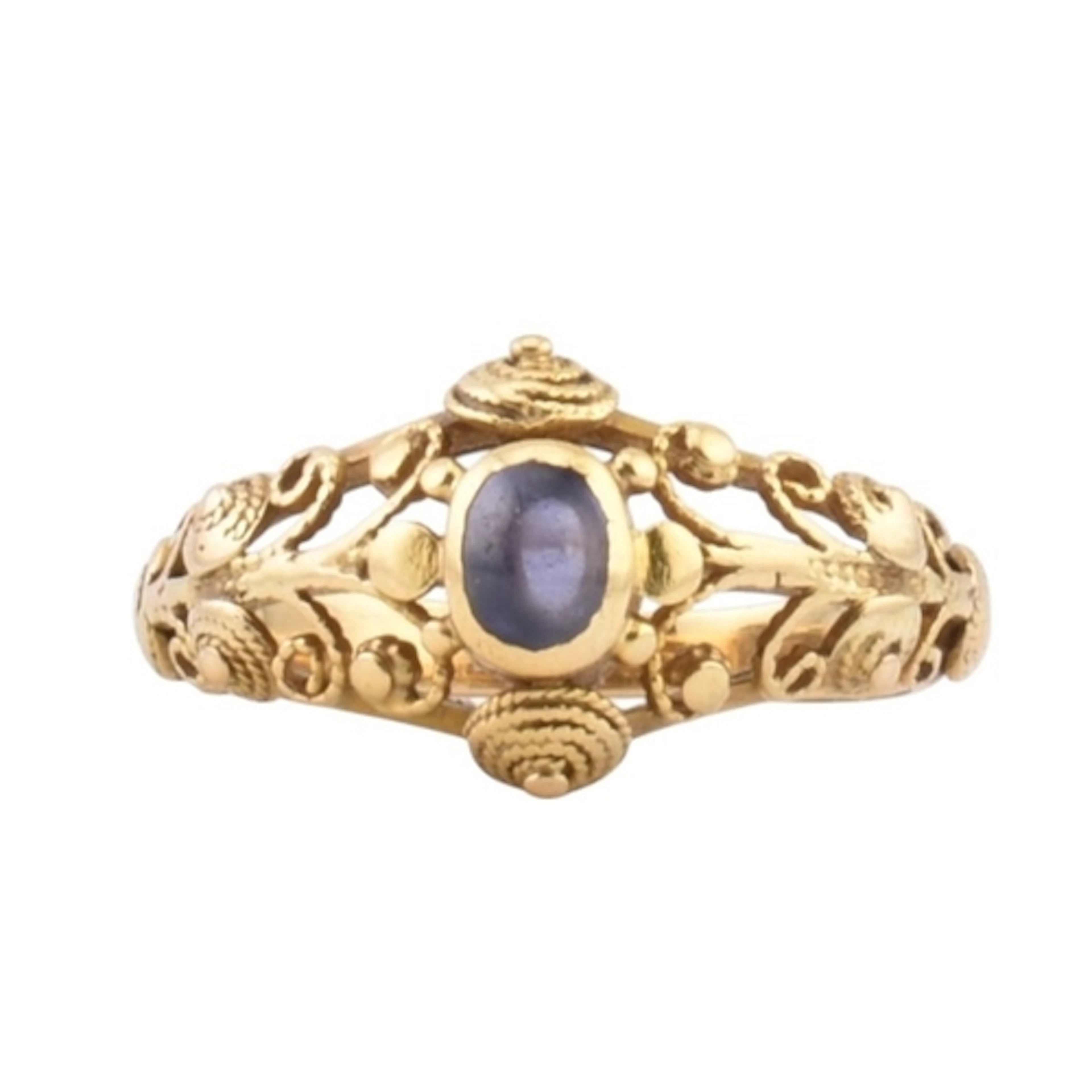 An Art & Crafts gold sapphire ring in the manner of John...
