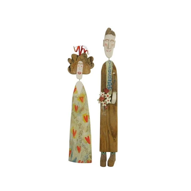 Lyn Muir, two painted driftwood figures. 'A bird in the hand...