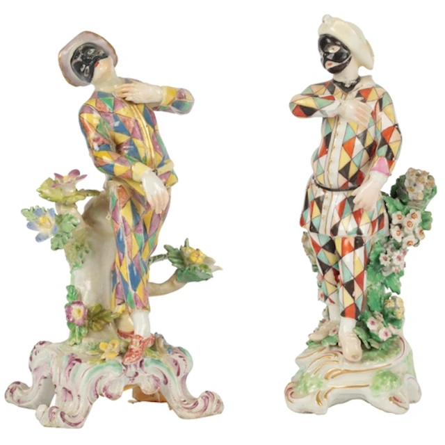 A Bow porcelain figure of a Harlequin, along with a Derby po...
