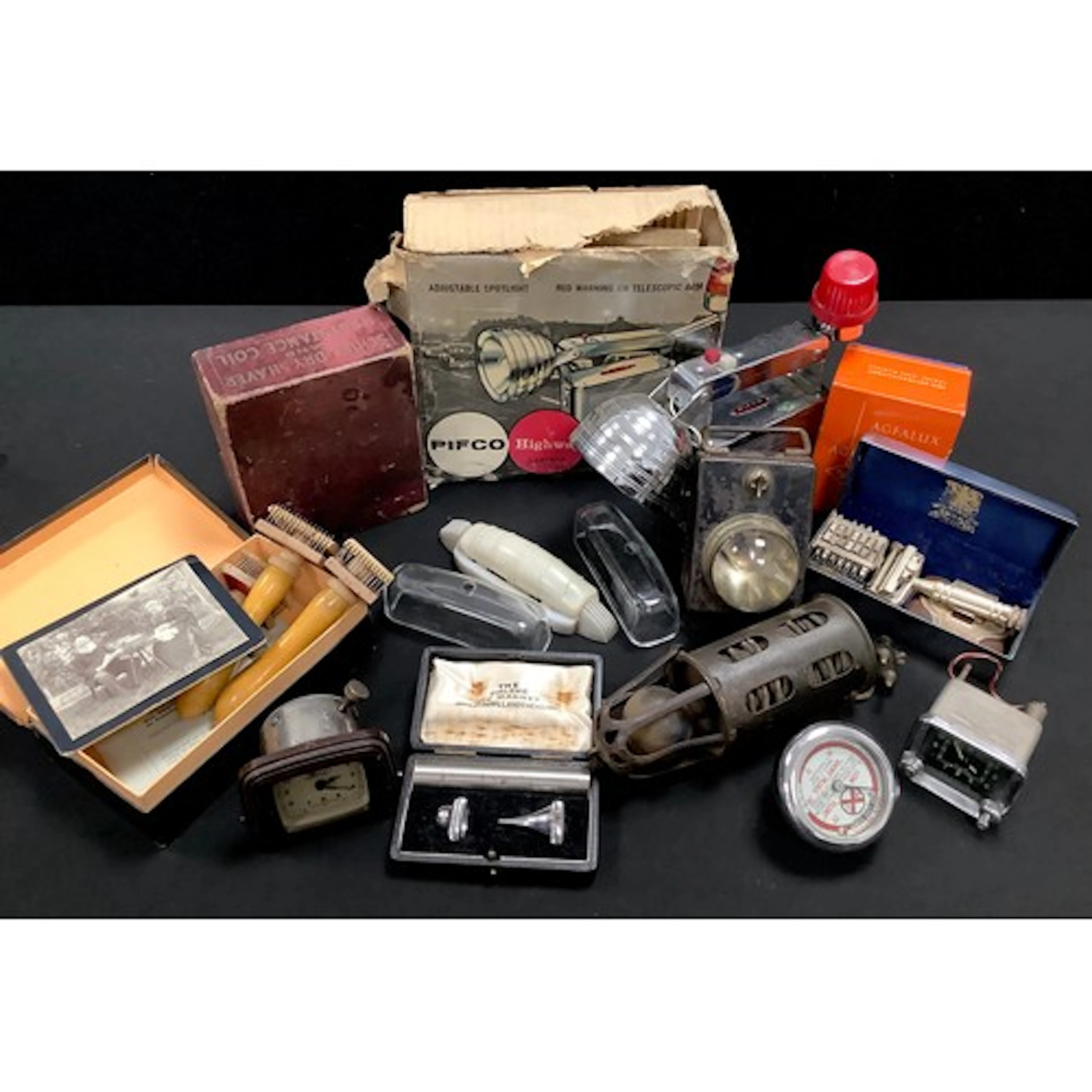 Automobilia - a Bakelite Ford car clock; a Jaeger car clock;...