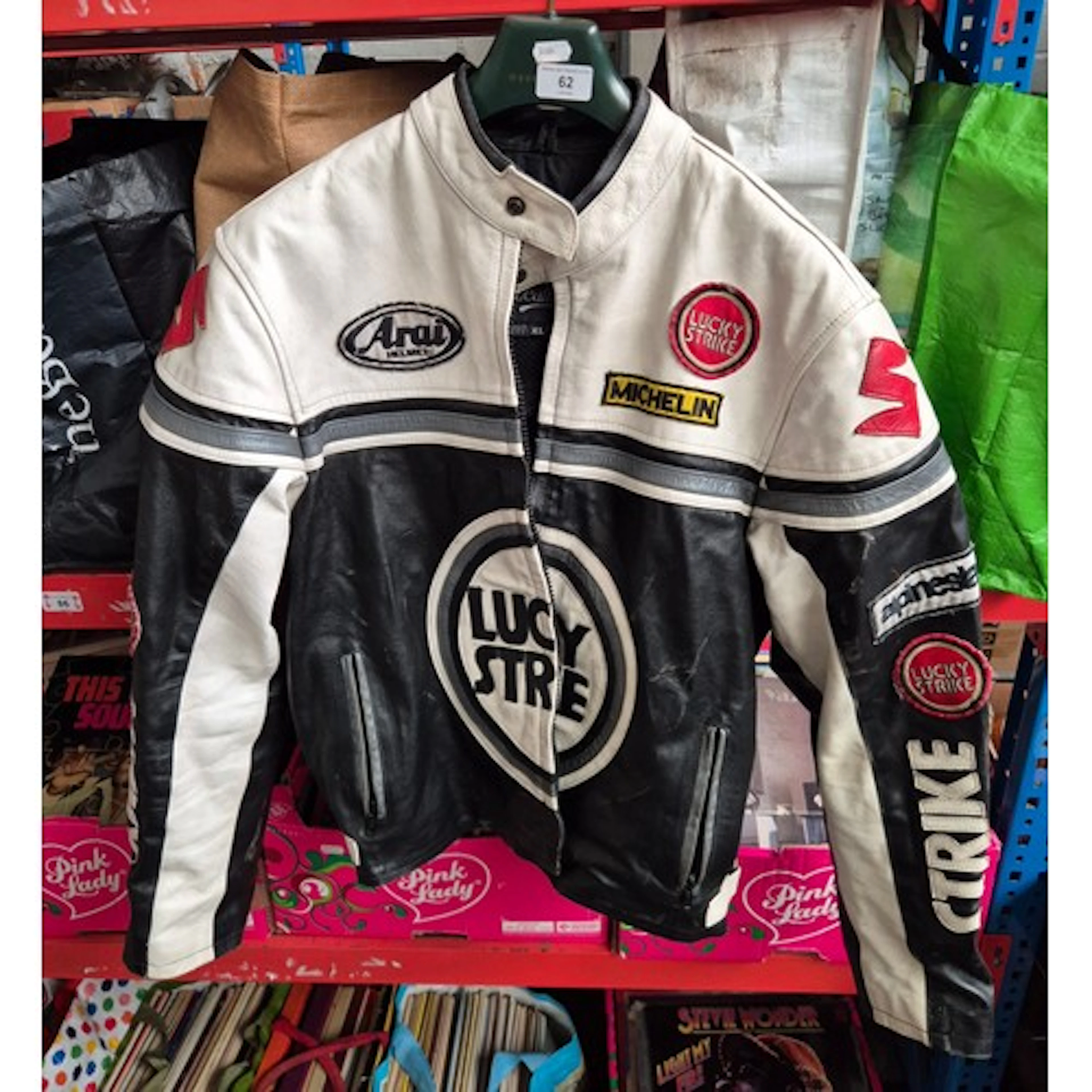 A leather motor bike jacket with Lucky Strike, Schwartz, Ara...