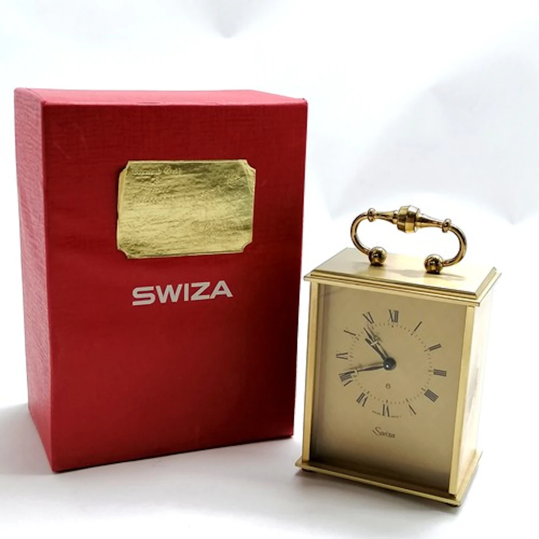 Swiza 8 day carriage clock with alarm feature in original re...