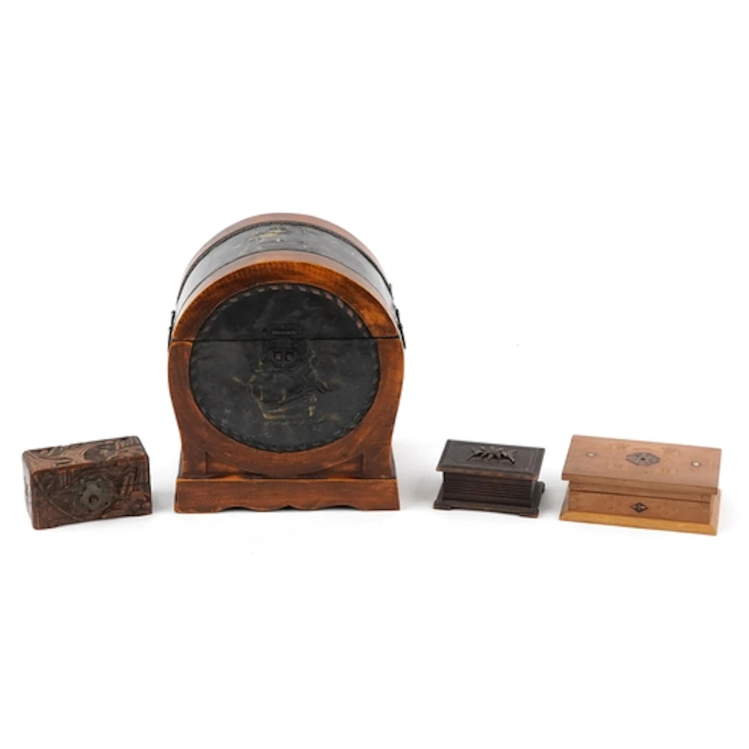 Four wooden boxes including shipping interest and carved exa...