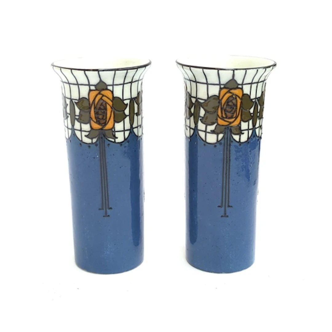 A pair of Wood & Sons Burslem 'Trellis' Art Nouveau tube lin...