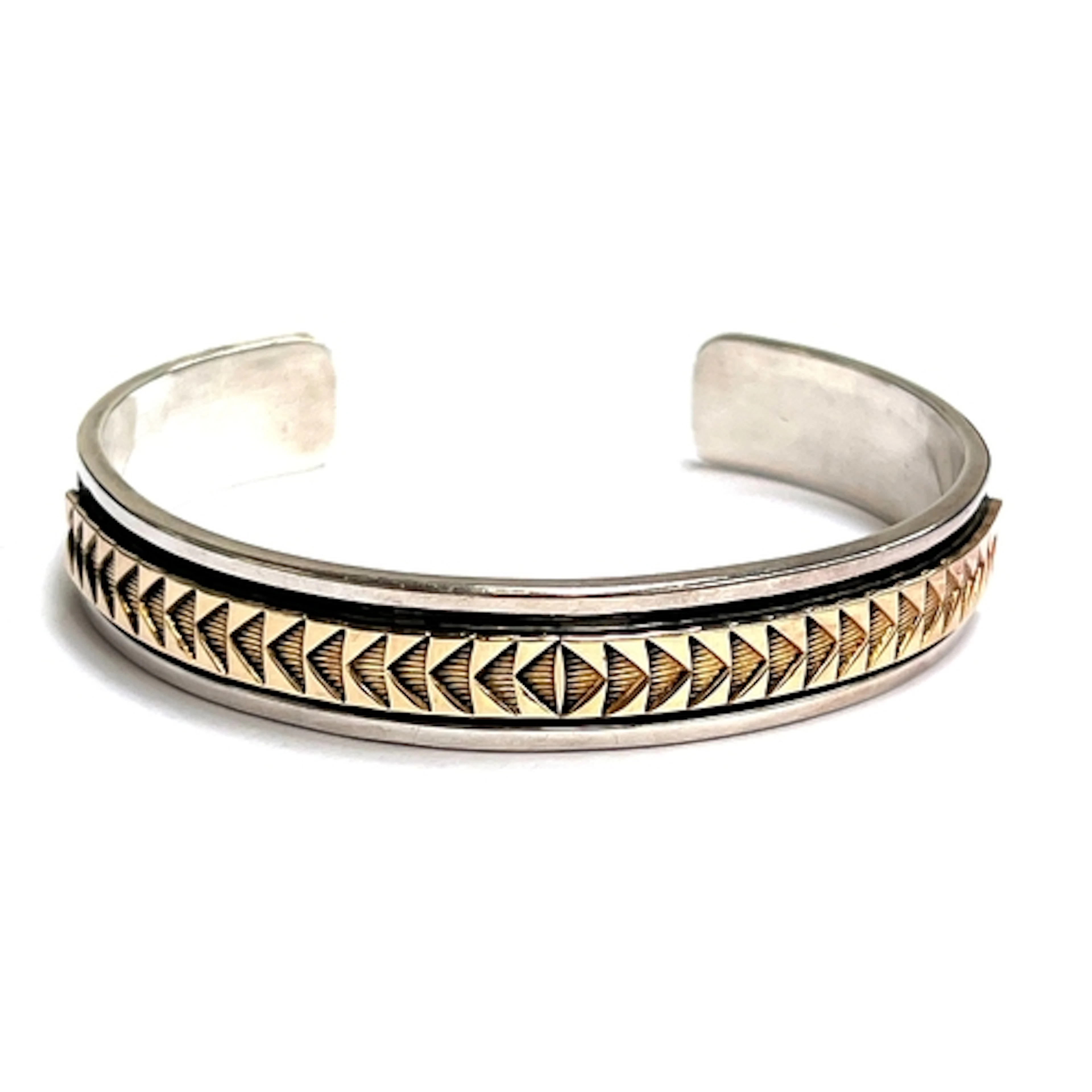 A vintage Julius Yazzie and M.M Rogers Native American sterl...