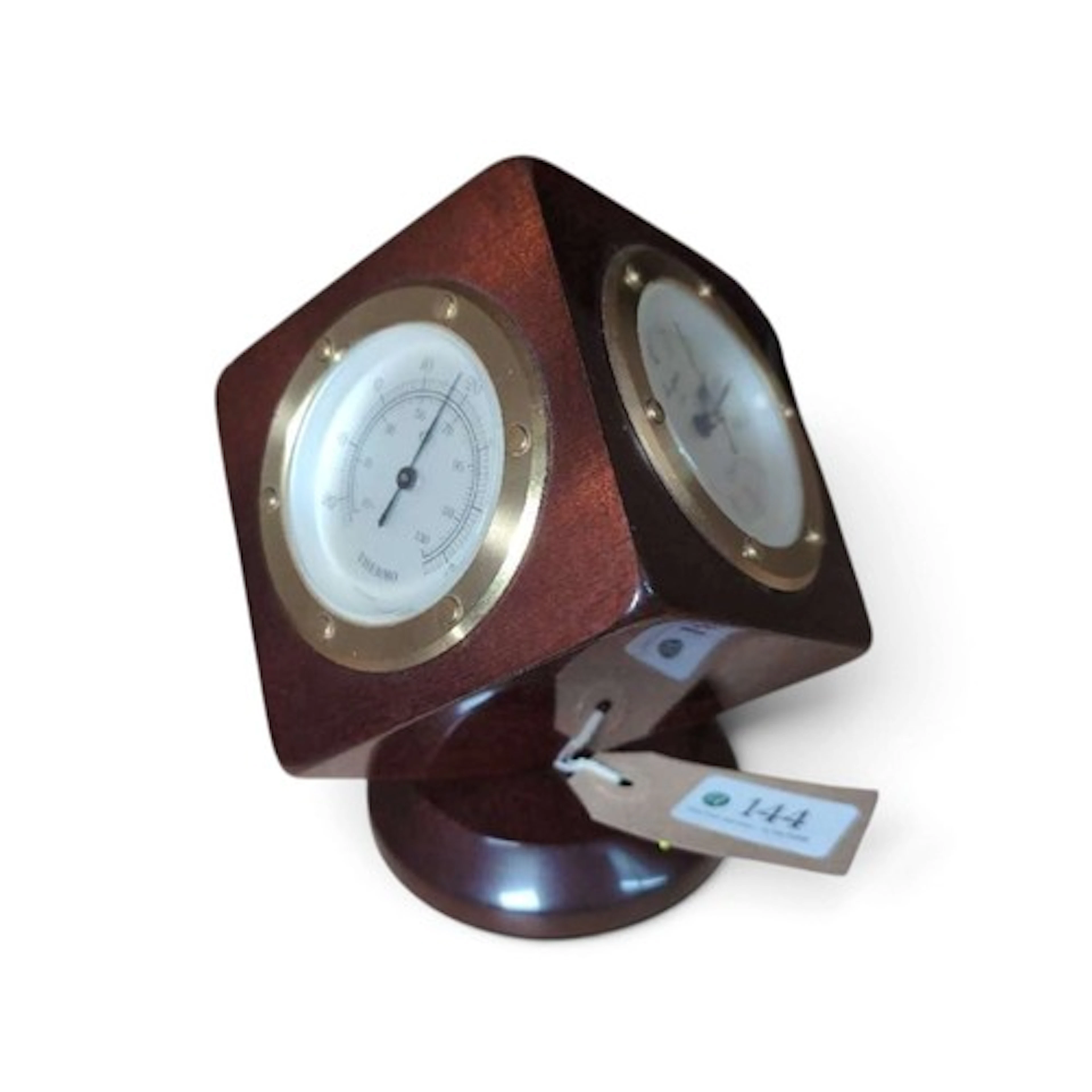 Mahogany and brass mounted desktop clock/barometer.