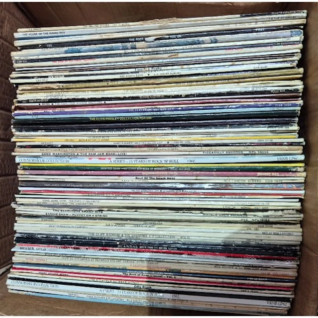 A box of over 80 rock/pop vinyl LPs from the 1960's to inclu...