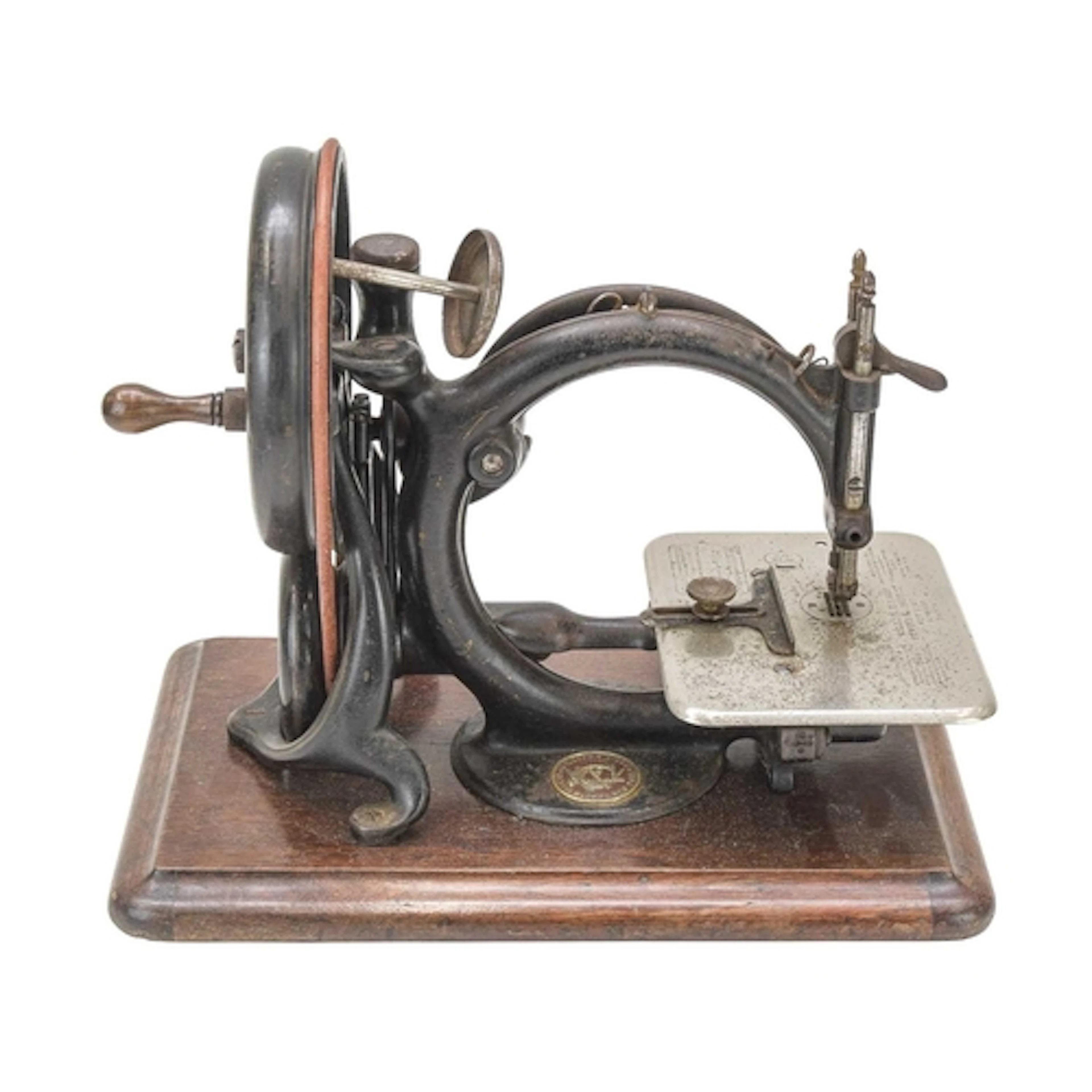An American hand crank sewing machine. Early 20th century, b...