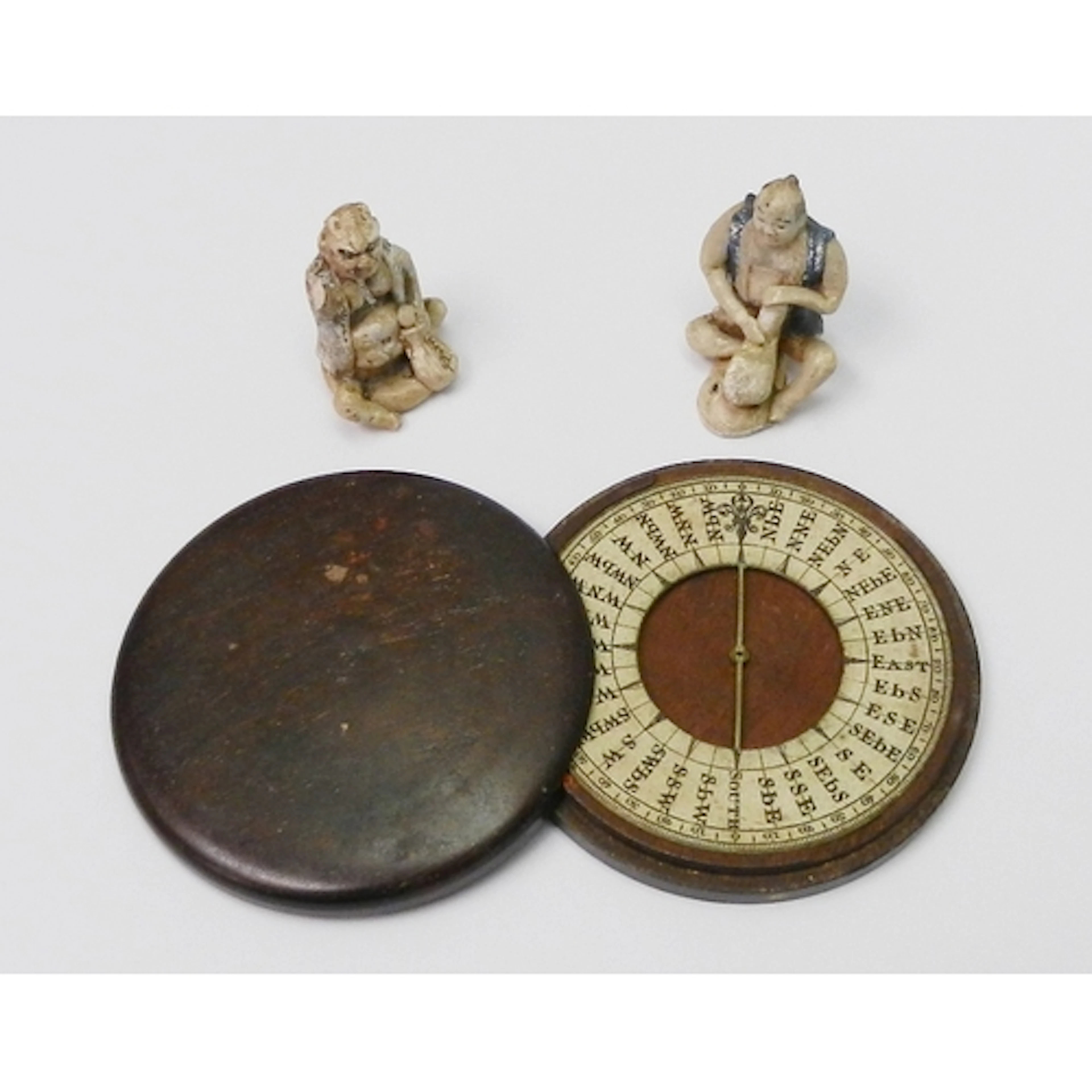 A 19th cent brass compass dial presented in a contemporary f...