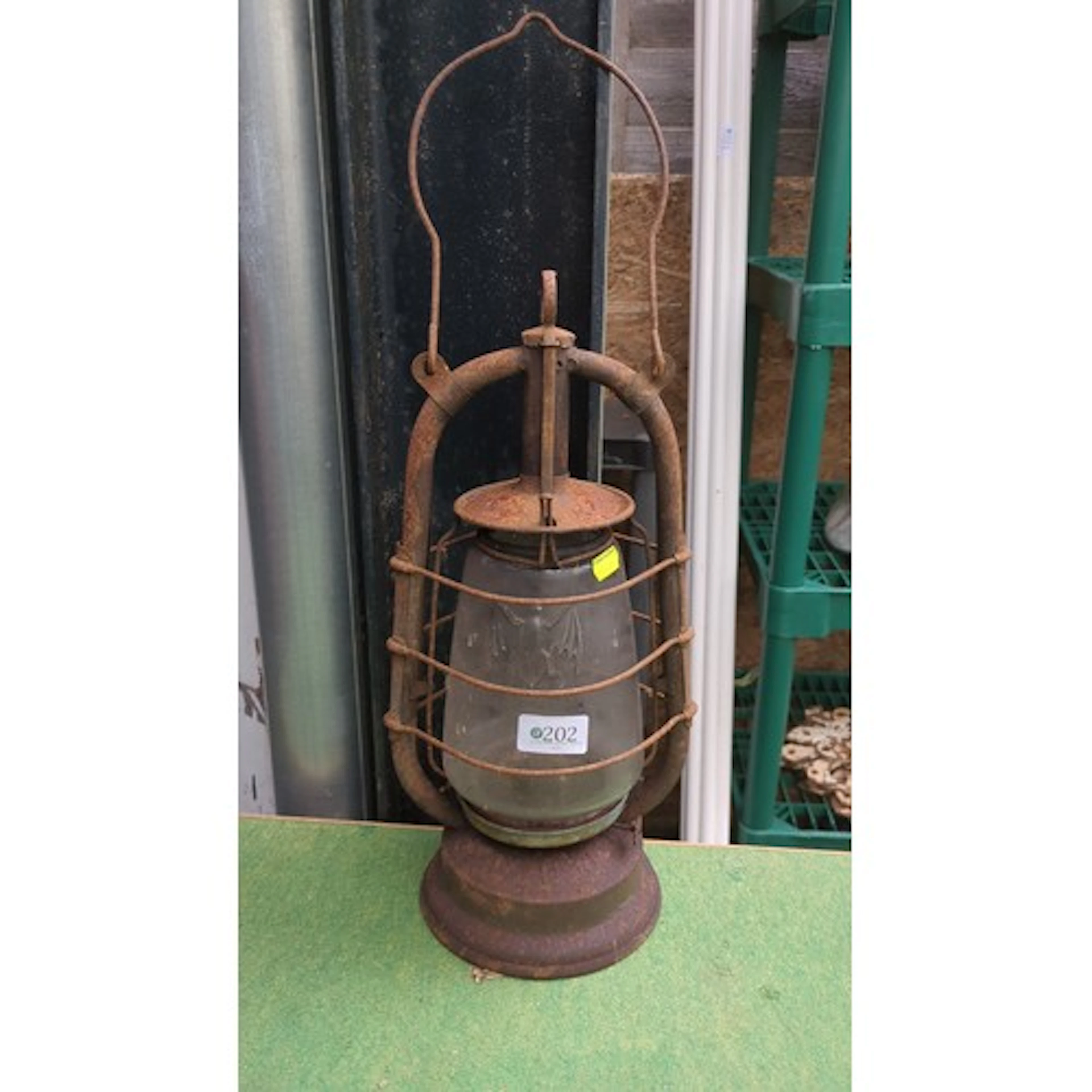 German industrial lantern of rounded form, the embossed meta...