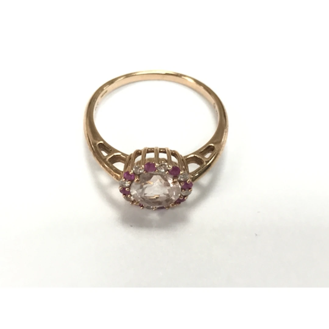 A 9ct rose gold r8ng set with morganite pink sapphire and wh...