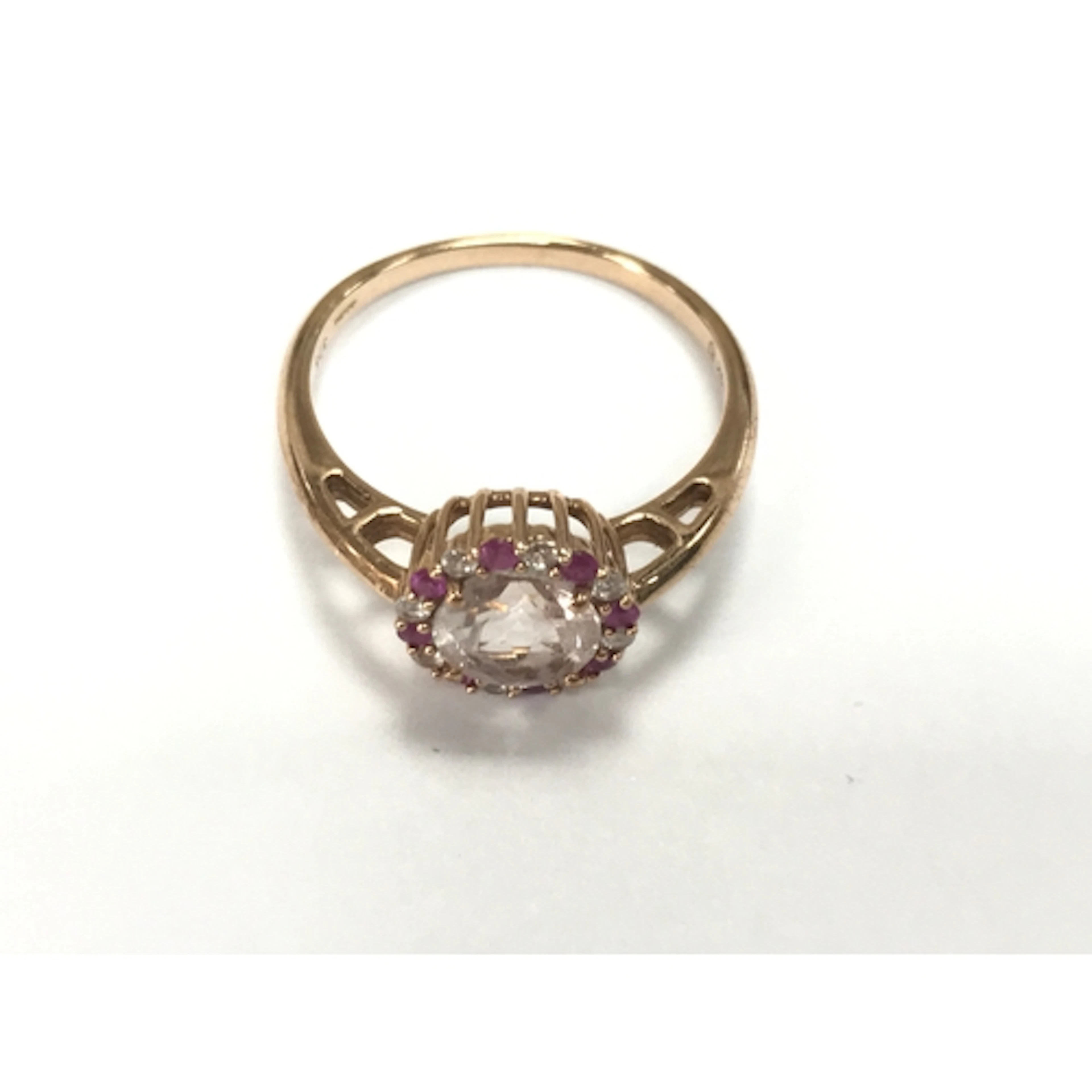 A 9ct rose gold r8ng set with morganite pink sapphire and wh...