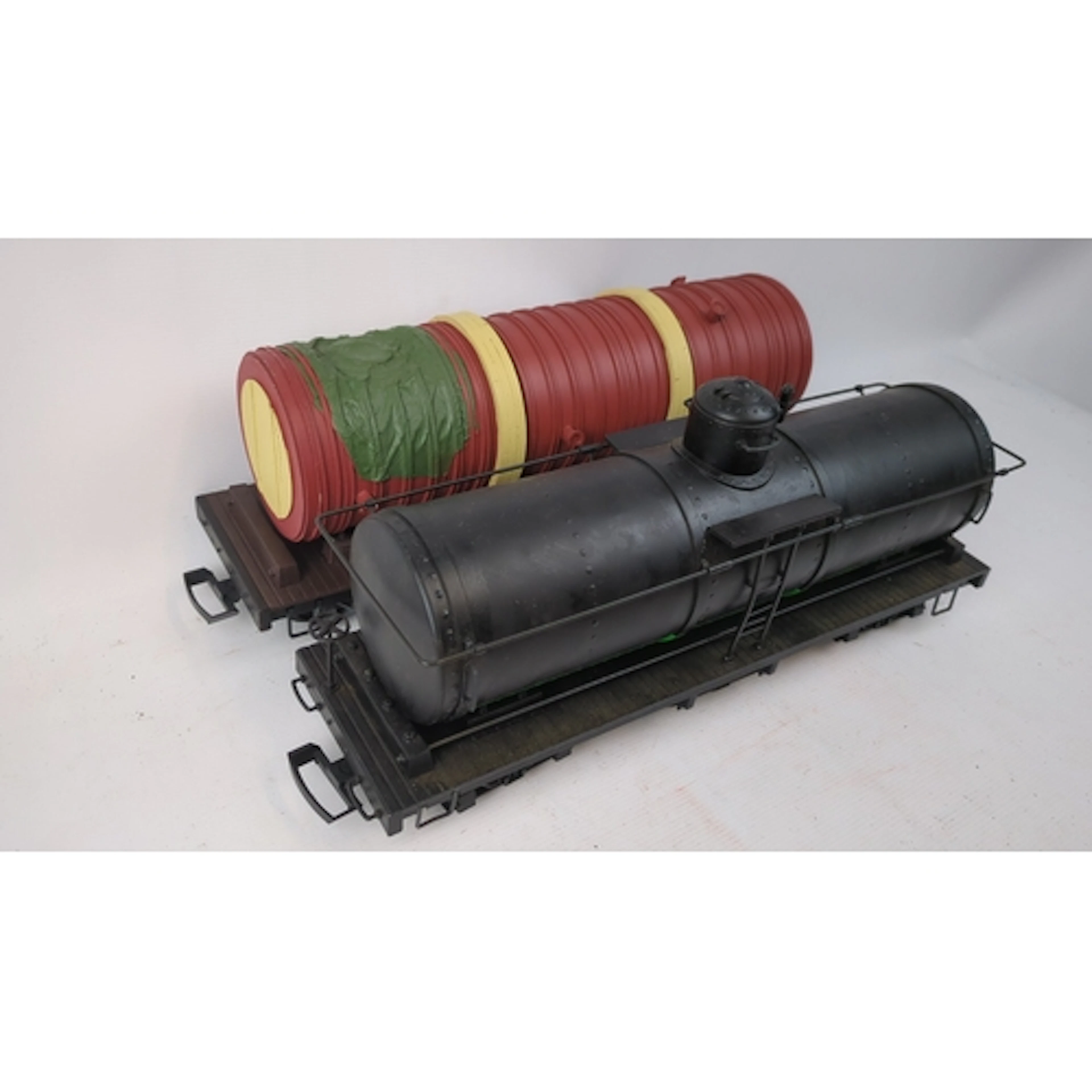 2 x model railway rolling stock, comprising flat wagons moun...
