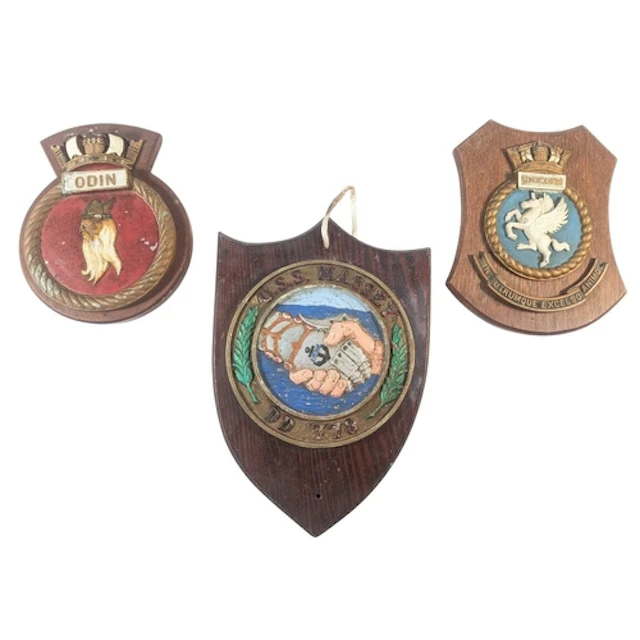 A collection of x3 vintage Naval ship's badge plaques mounte...