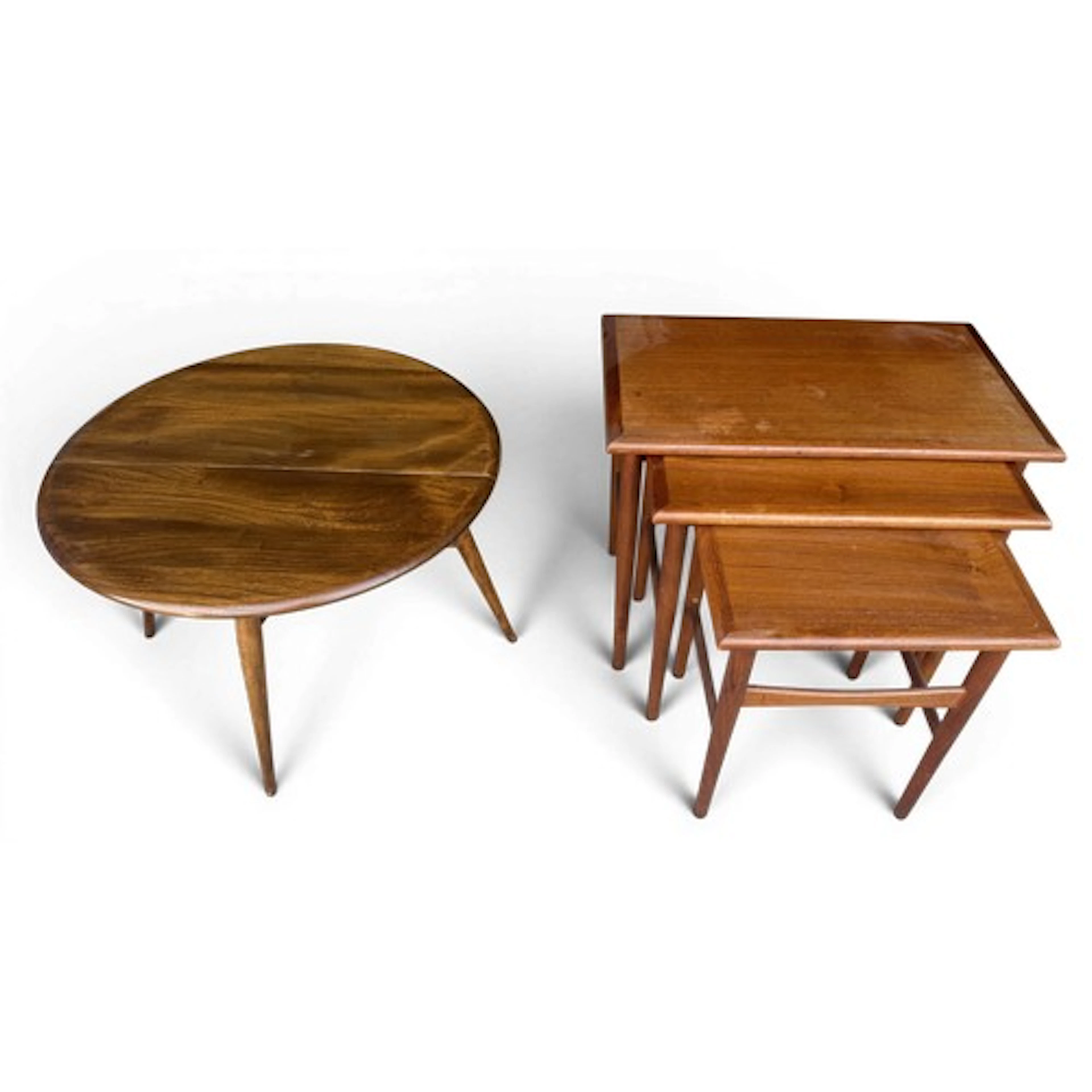 A circular Ercol table 42cm h x 62cm d together with a nest ...