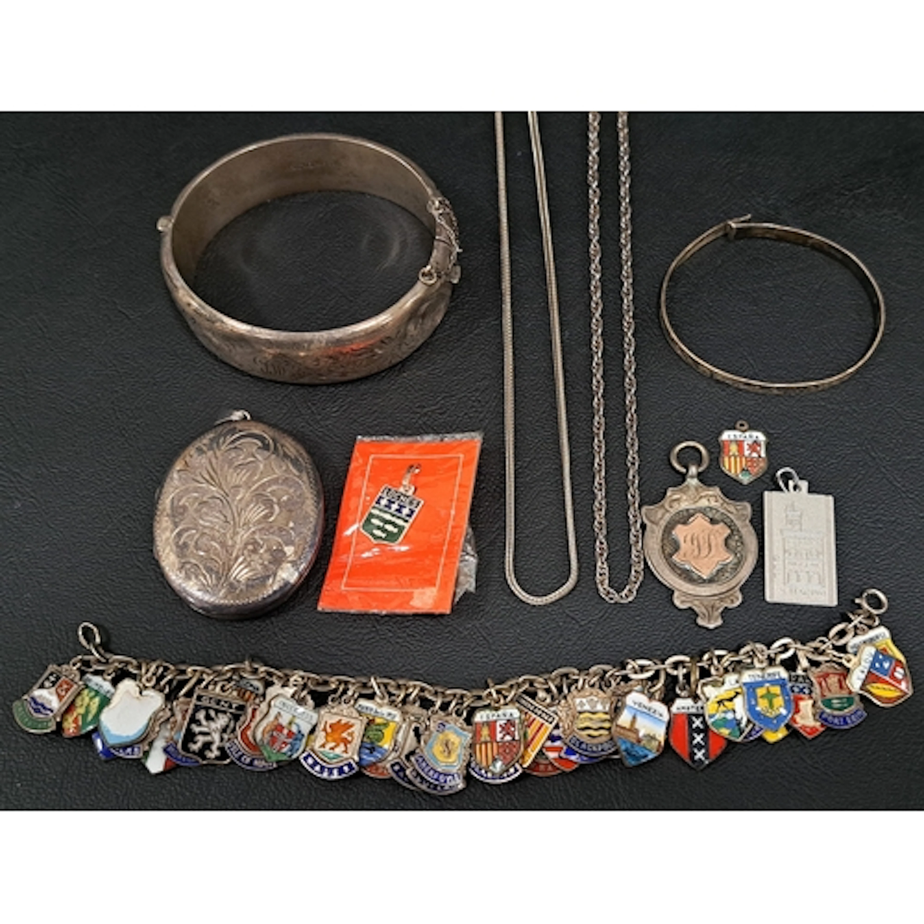 SELECTION OF SILVER JEWELLERY including an oval locket penda...