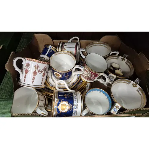 A box of mixed pottery including mugs, plates etc. Includes ...